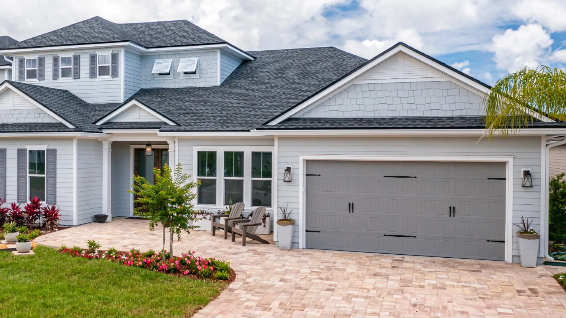 a house with a brick driveway