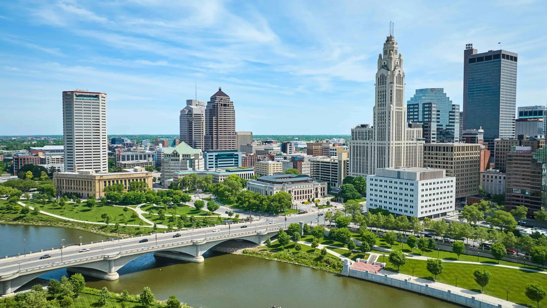 a bridge over a river in a city