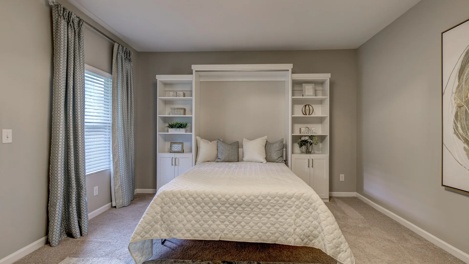 white cabinet wall bed pull down and with white comforter and grey and white pillows