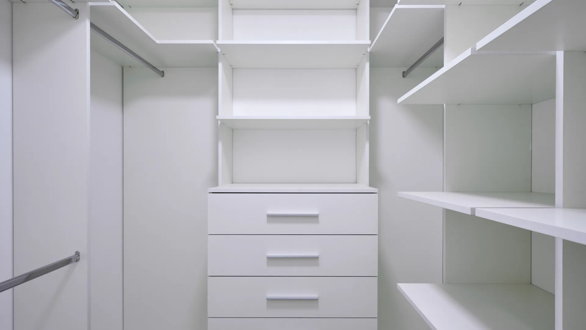 a white shelf with drawers