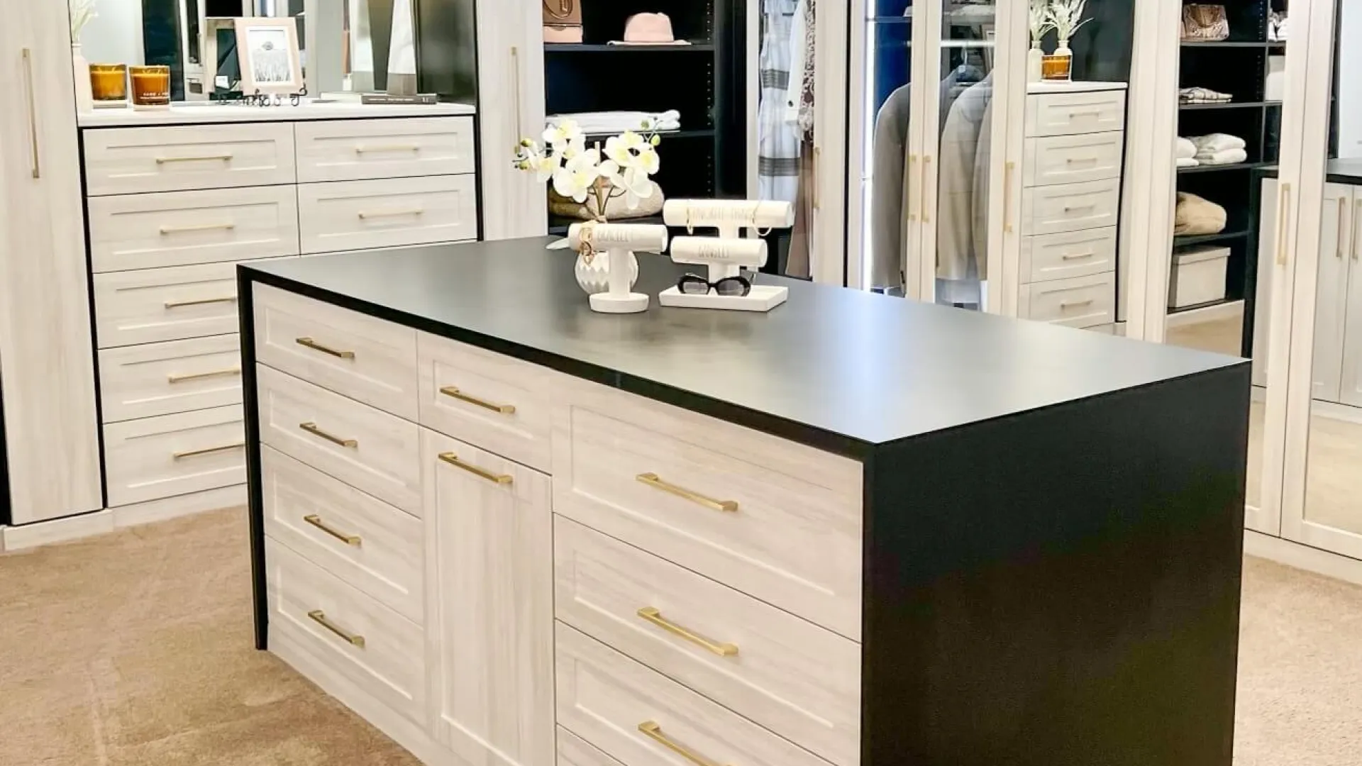 a kitchen with white cabinets