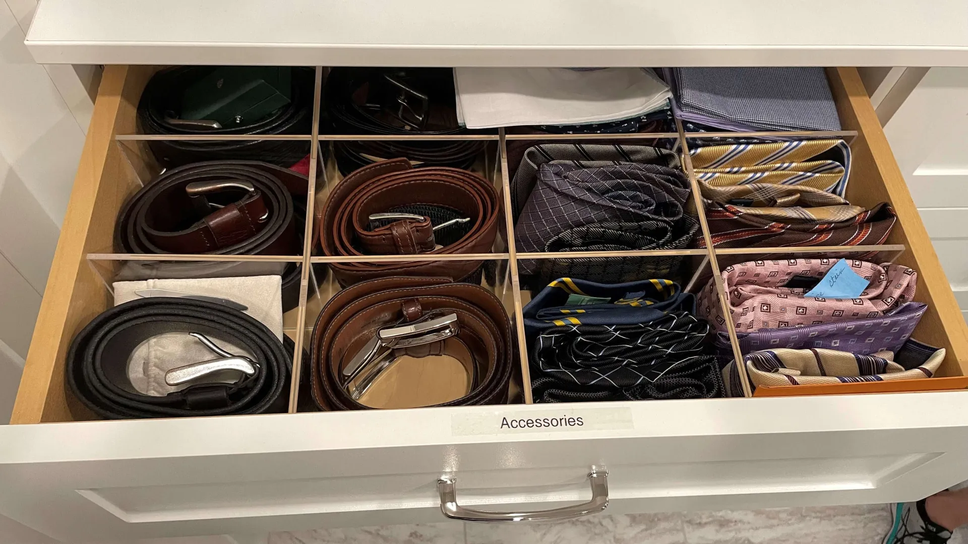 a shelf with a variety of shoes