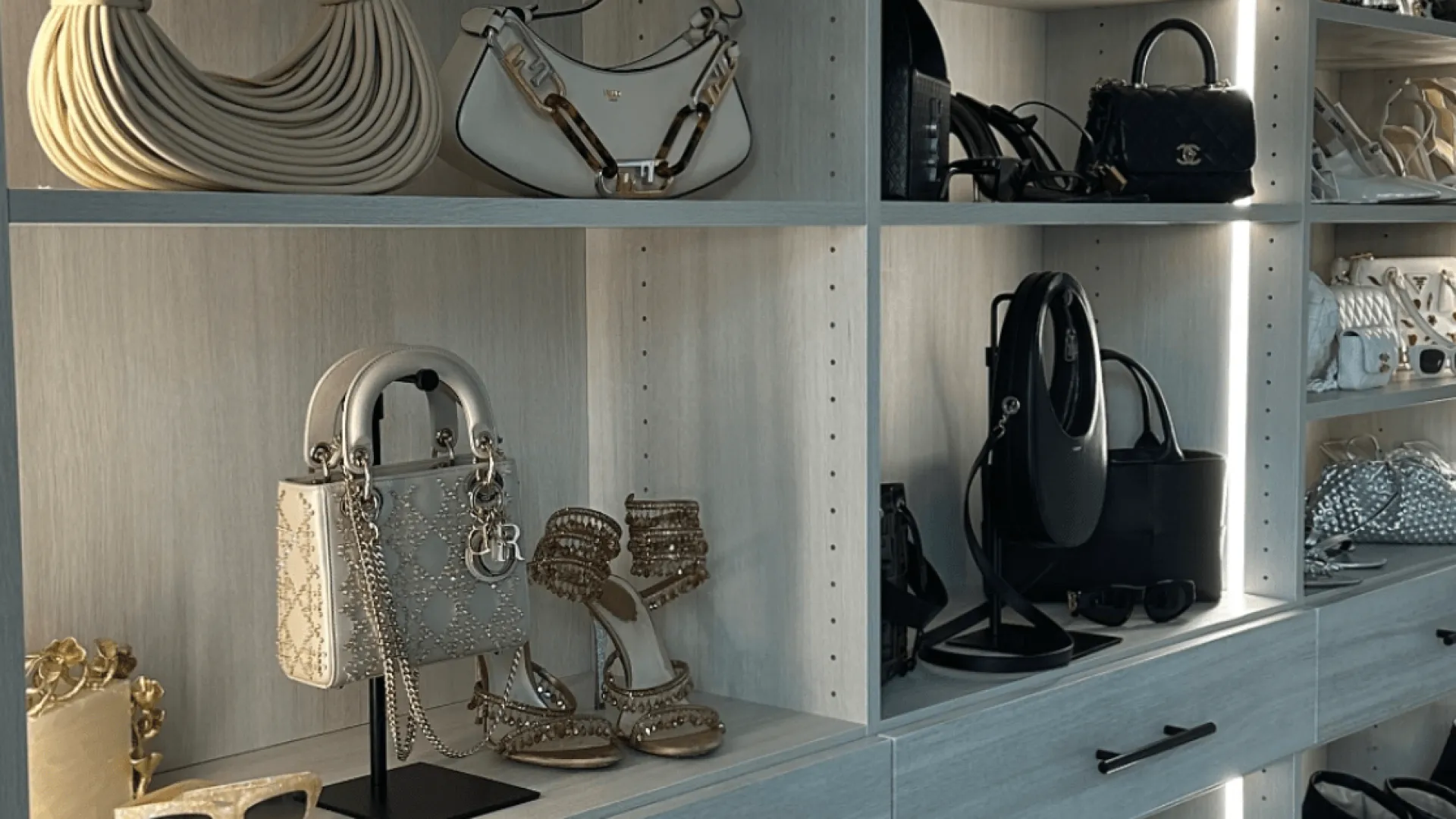 shelf with shoes on it - Lighting in a Custom Closet Design