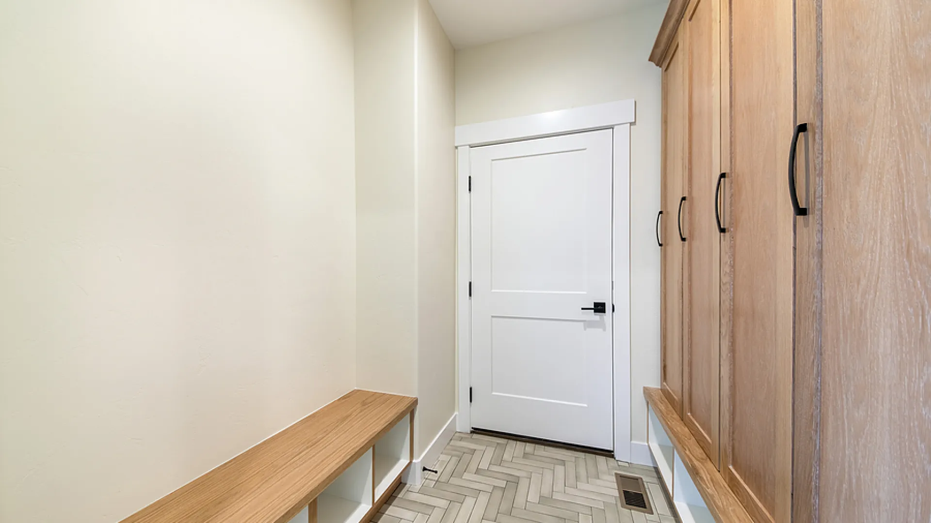 a hallway with wooden doors