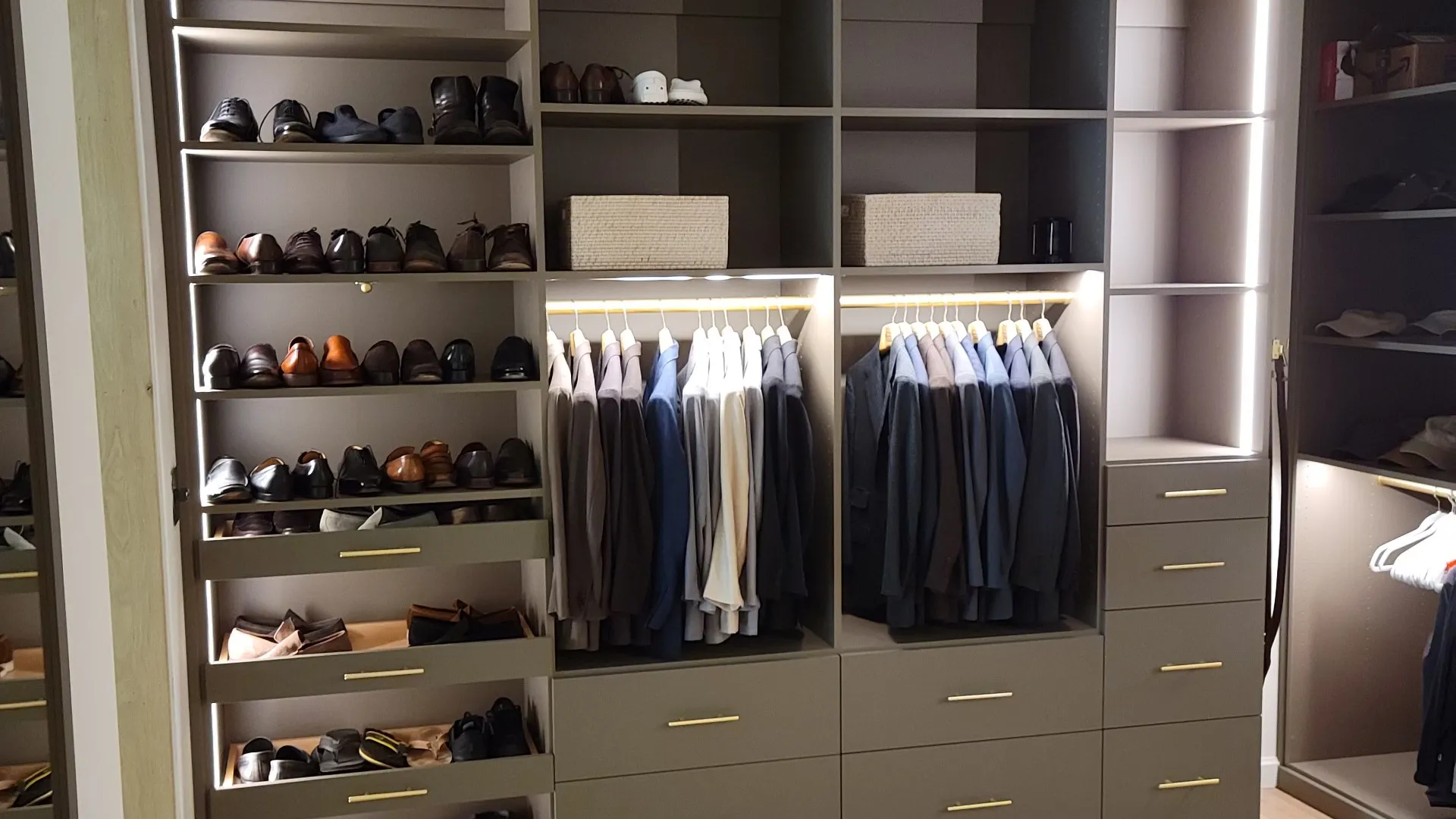 a closet with a variety of clothes