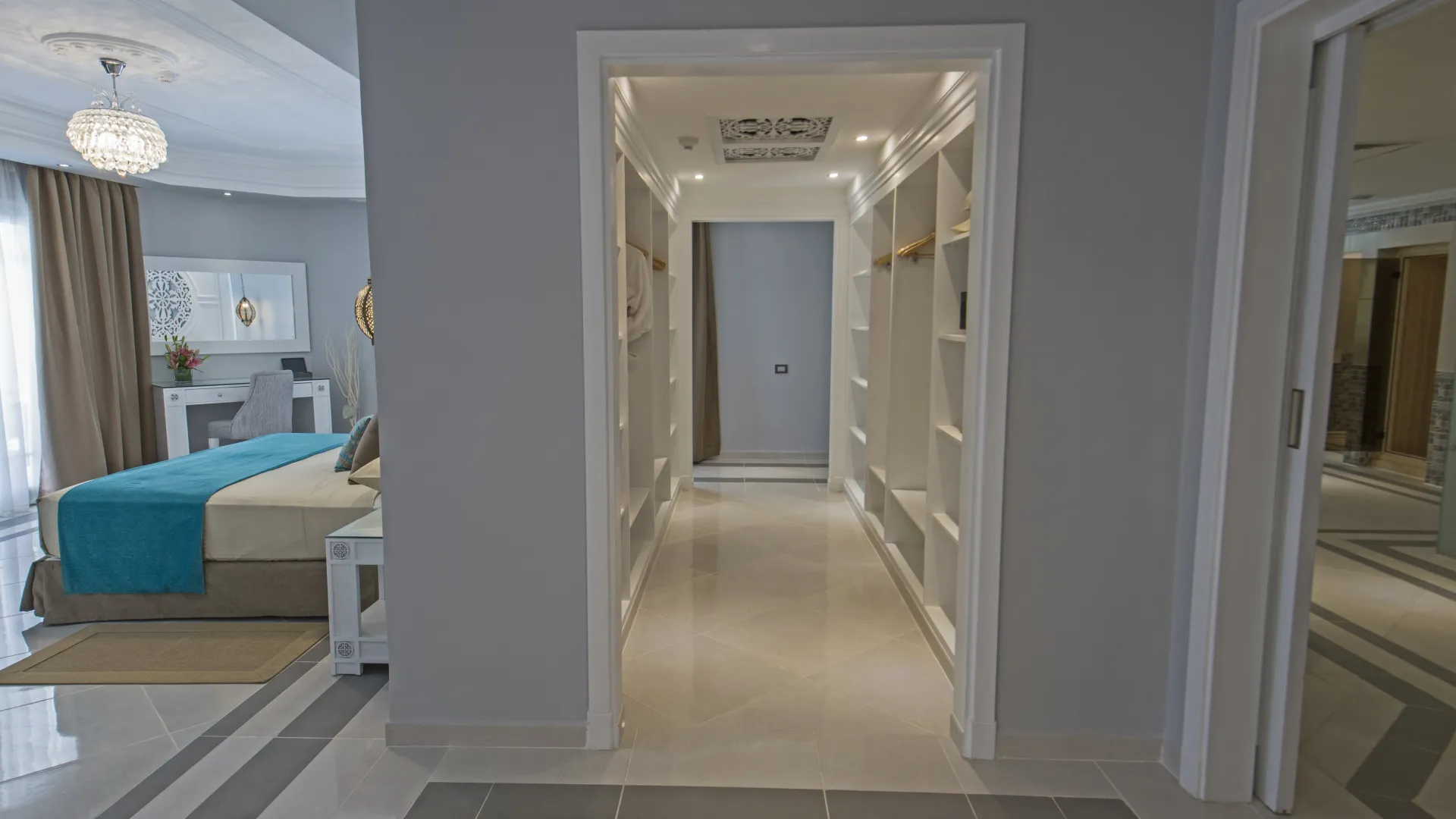 A master room with a custom walk through closet