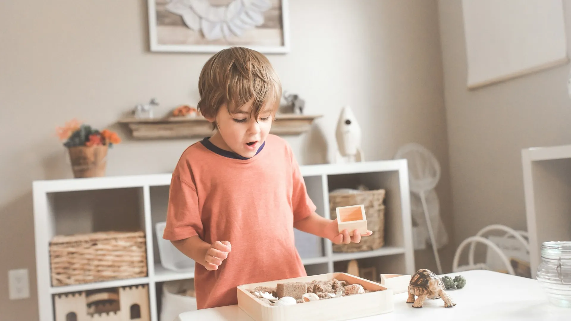 a boy sitting at a table