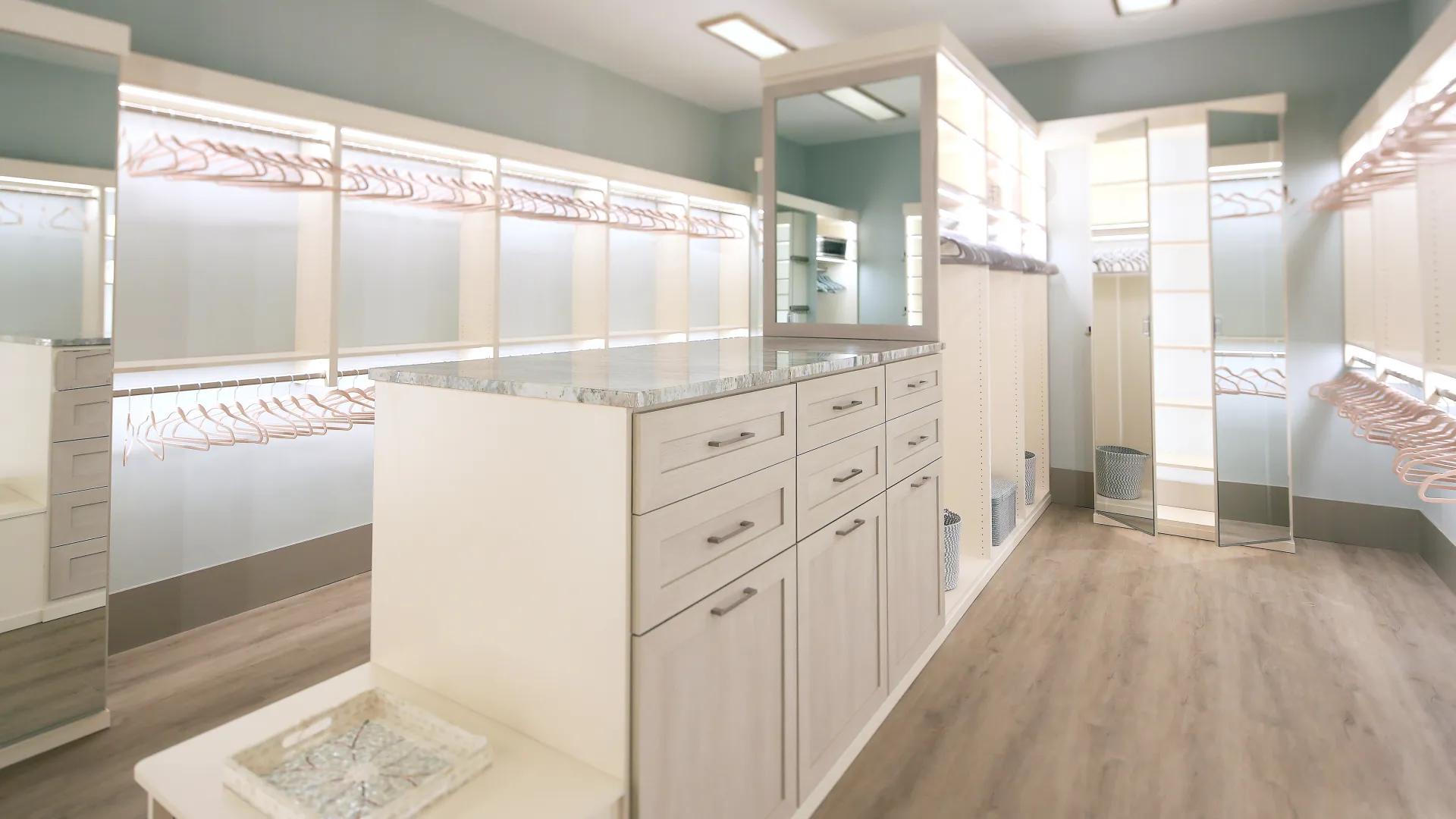 a large kitchen with white cabinets