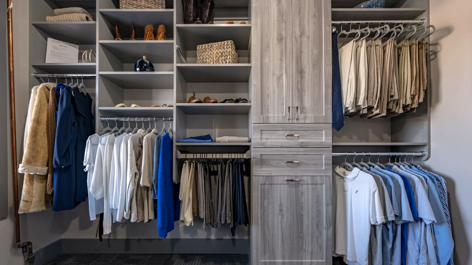 a closet with clothes and clothes