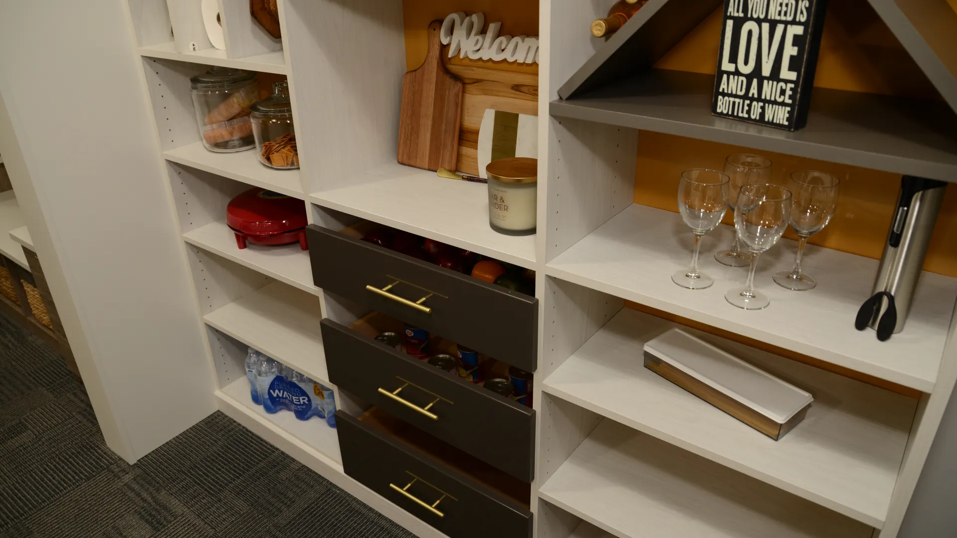 a kitchen with wine glasses