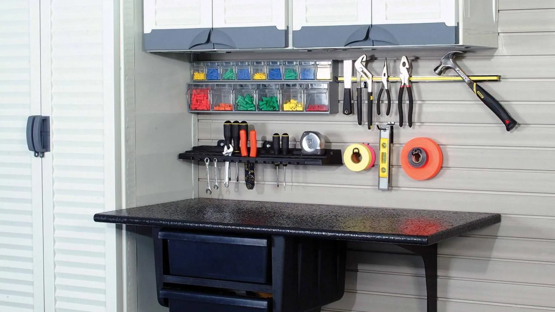 a kitchen with a table and shelves