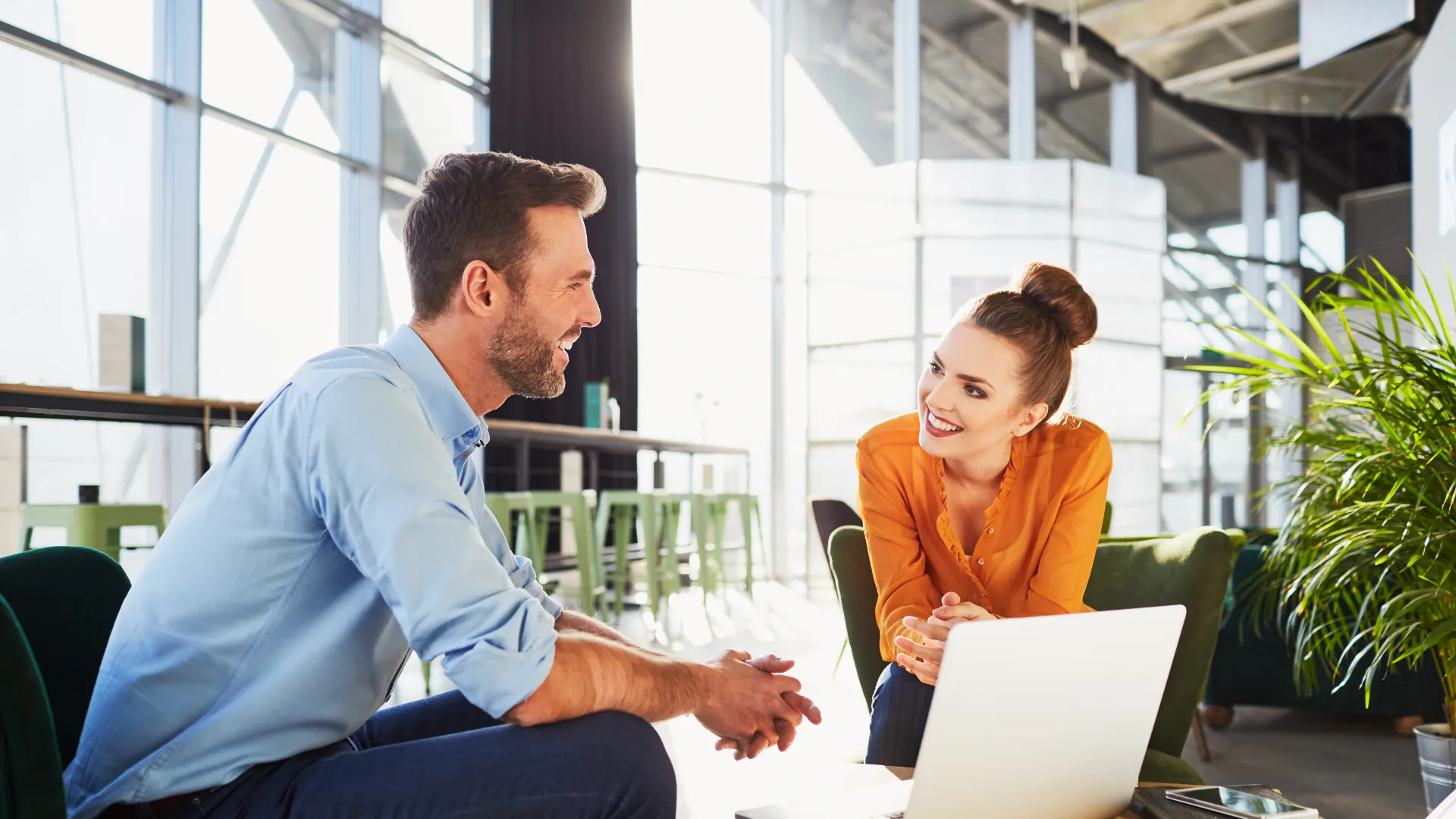 a man and a woman having a conversation