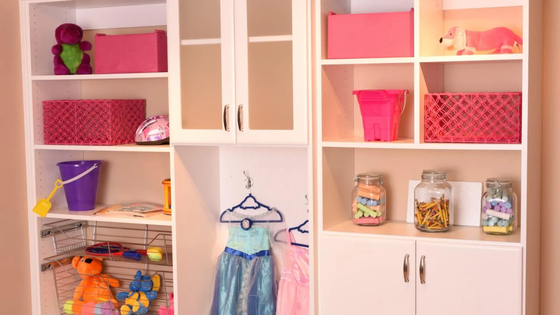 a white shelving unit with shelves and objects on it