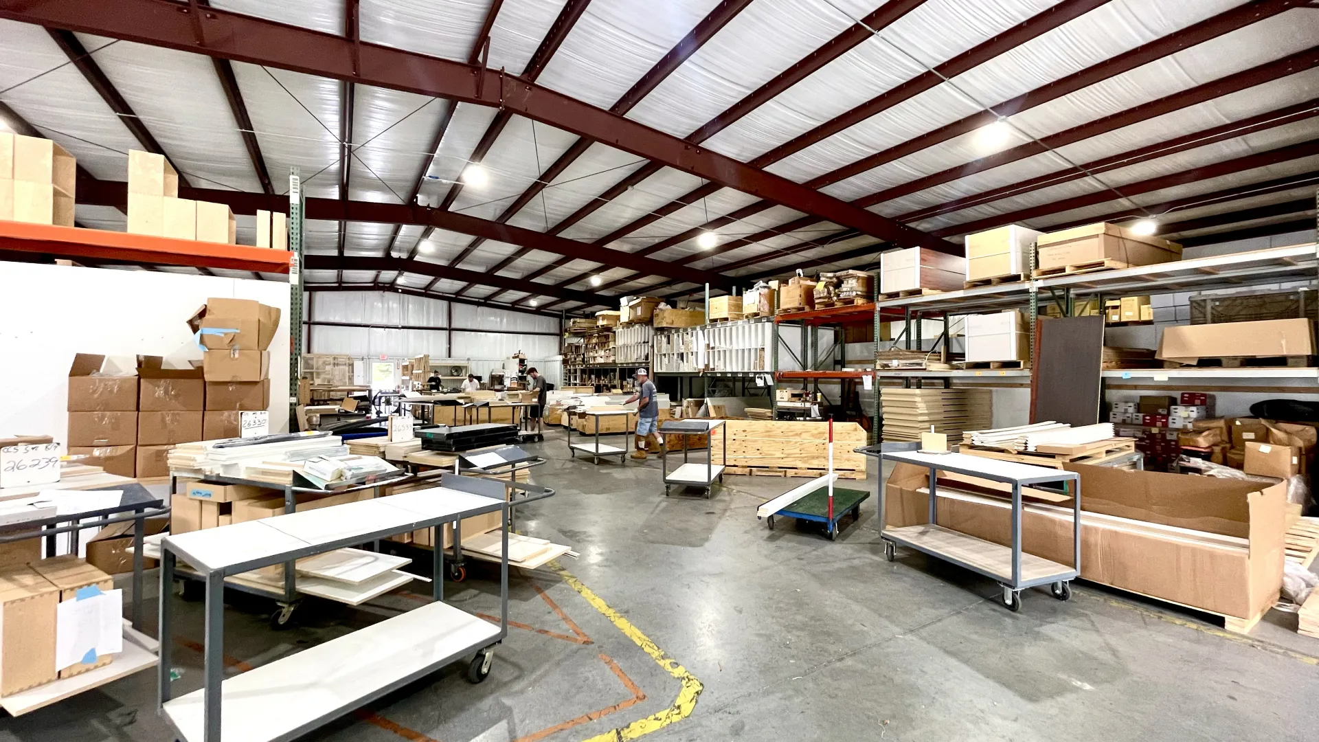 a warehouse with tables and chairs