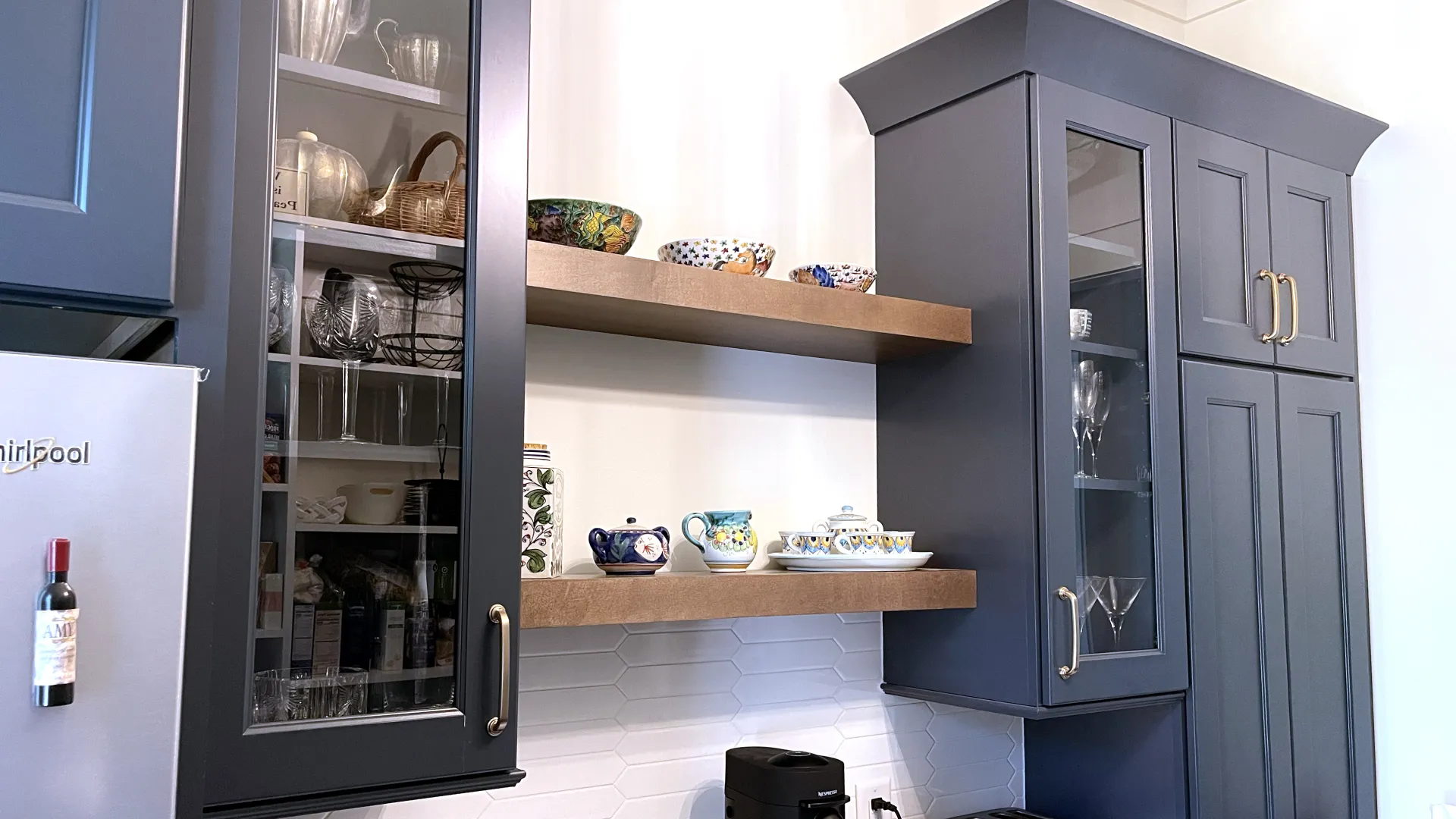 a kitchen with blue cabinets