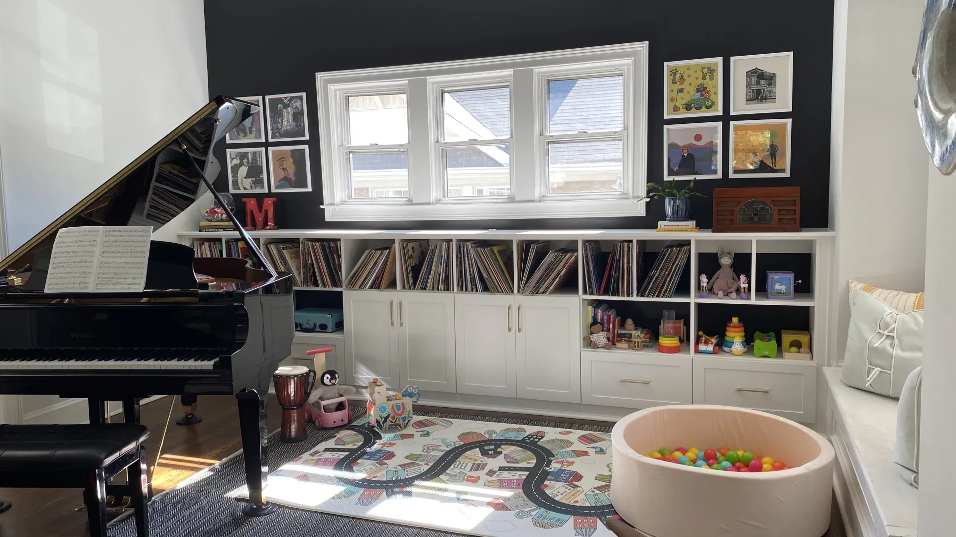 a room with a piano and a rug