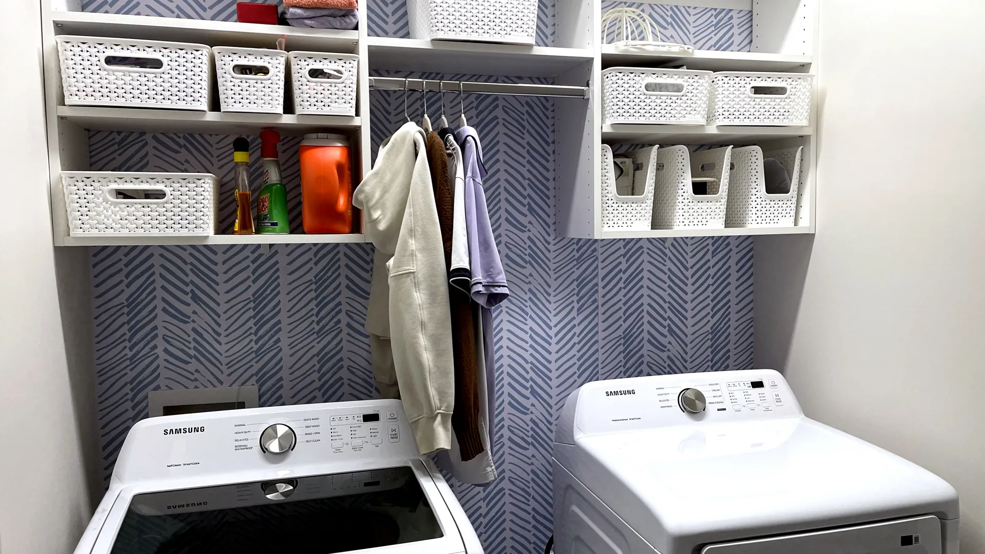 a laundry room with a washer and dryer