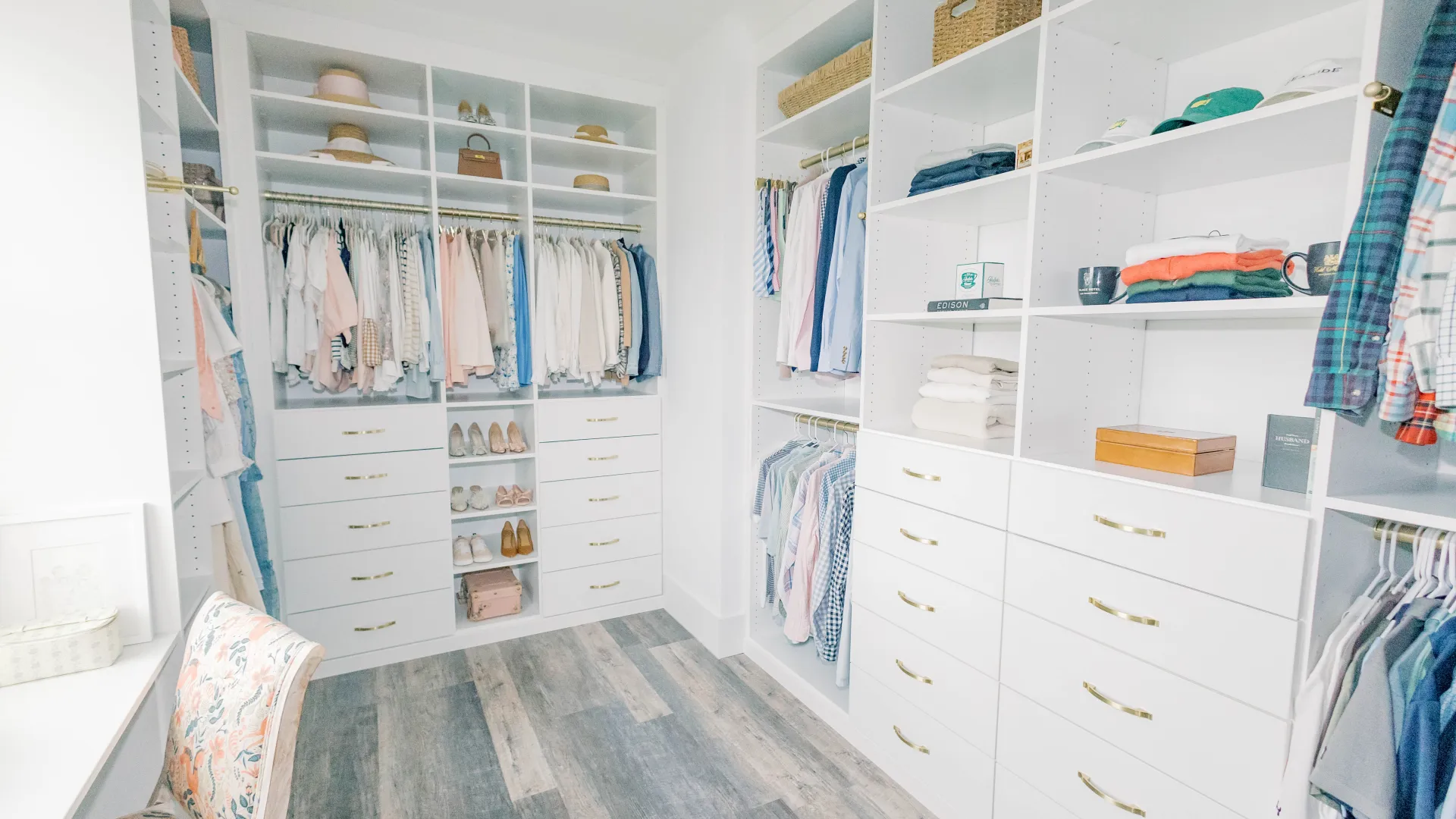 a closet with white drawers