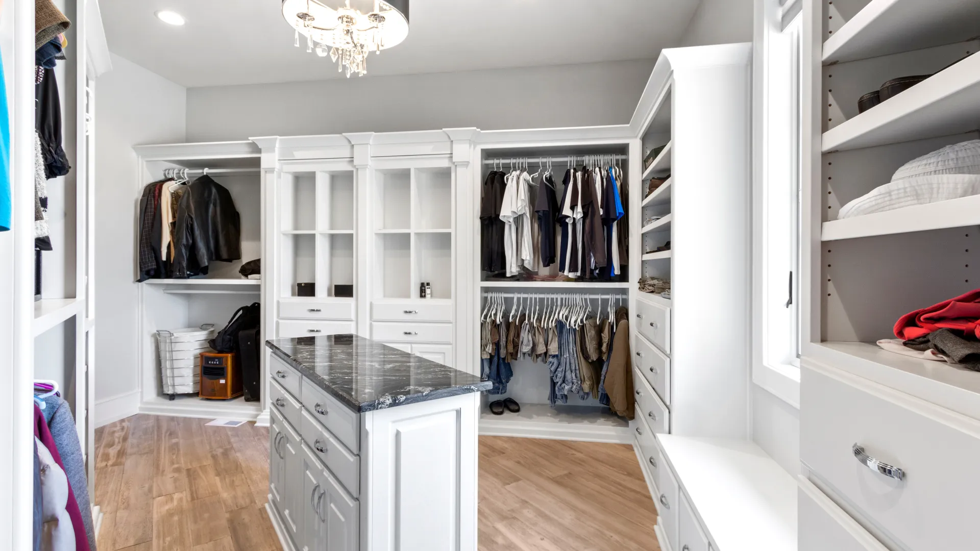 a white closet with white cabinets