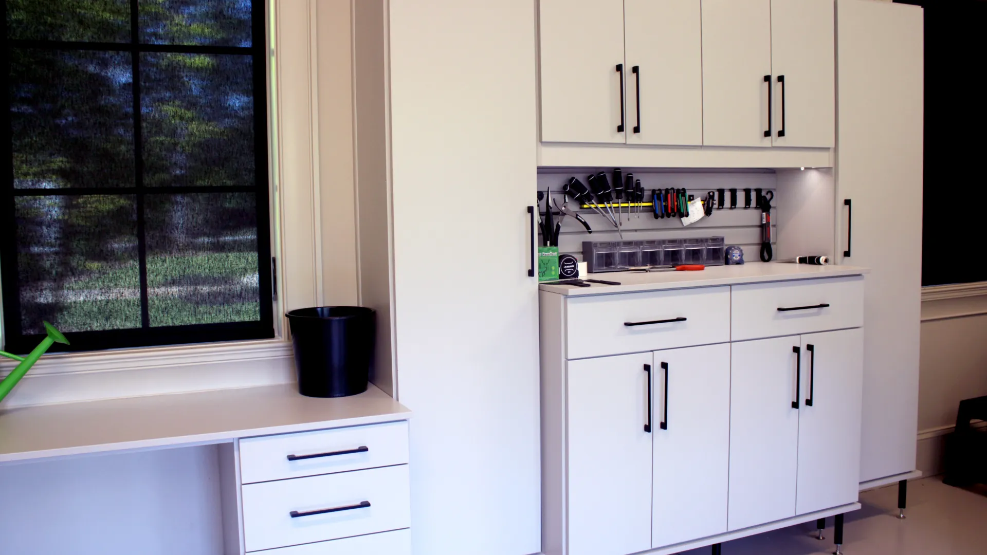 a kitchen with white cabinets