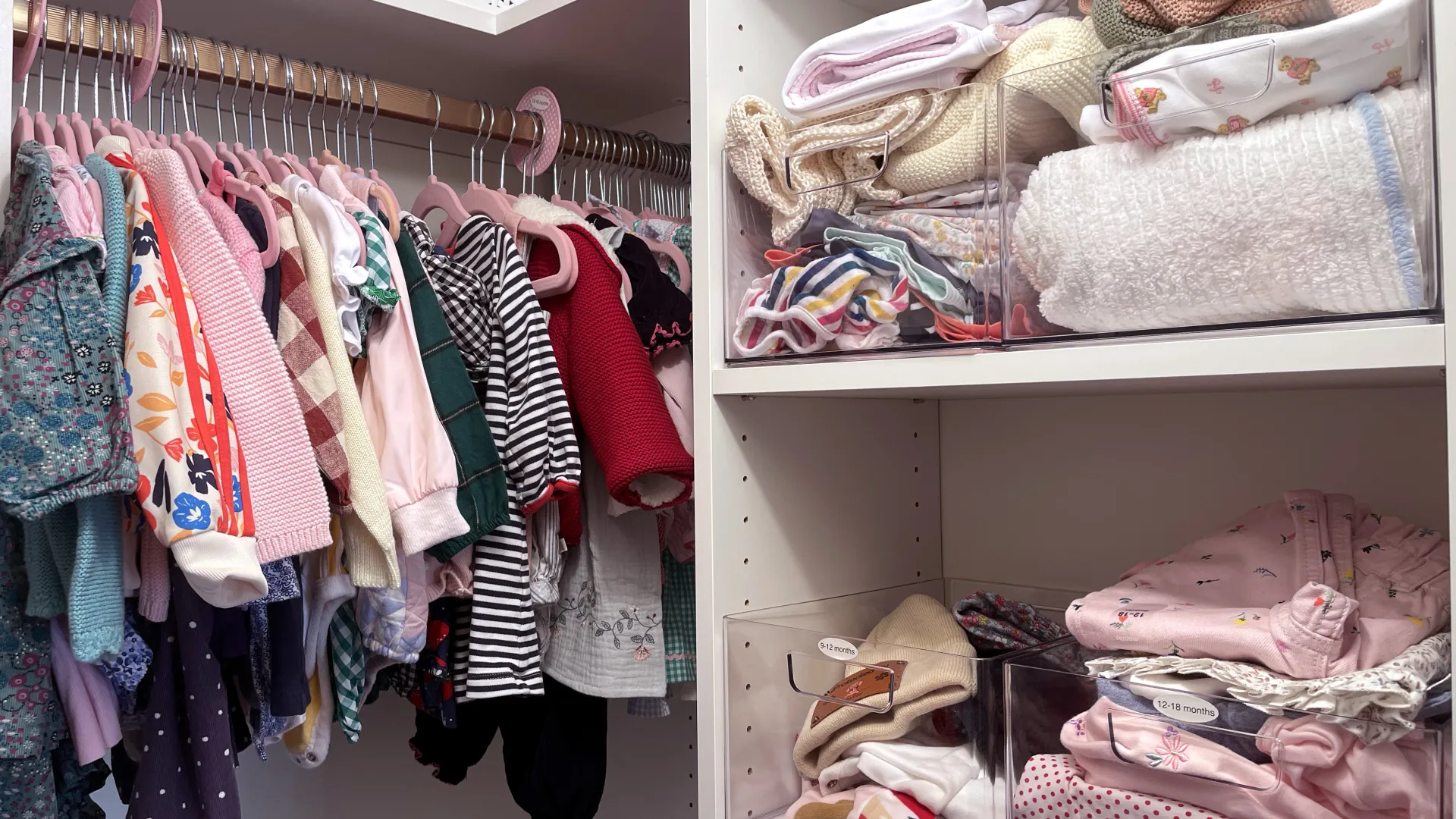 a baby closet with lots of todler clothing and accesories