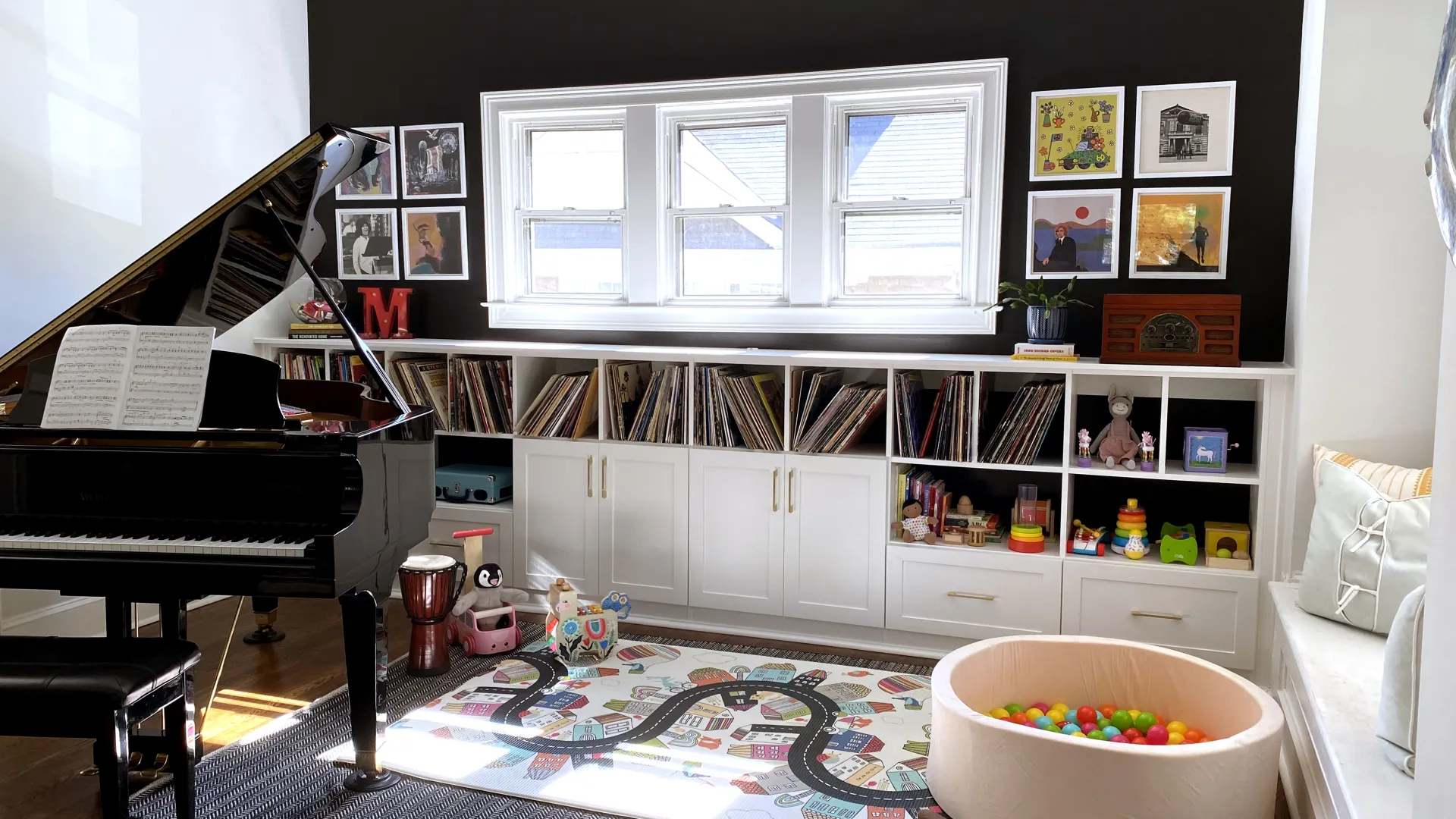 a room with a piano and a rug