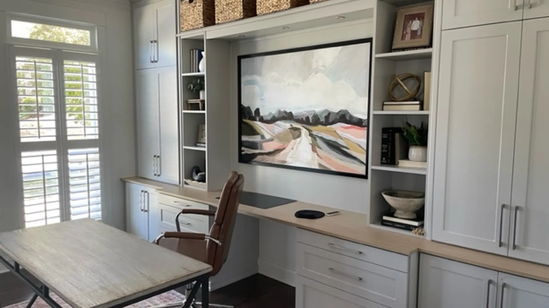 a kitchen with a table and chairs