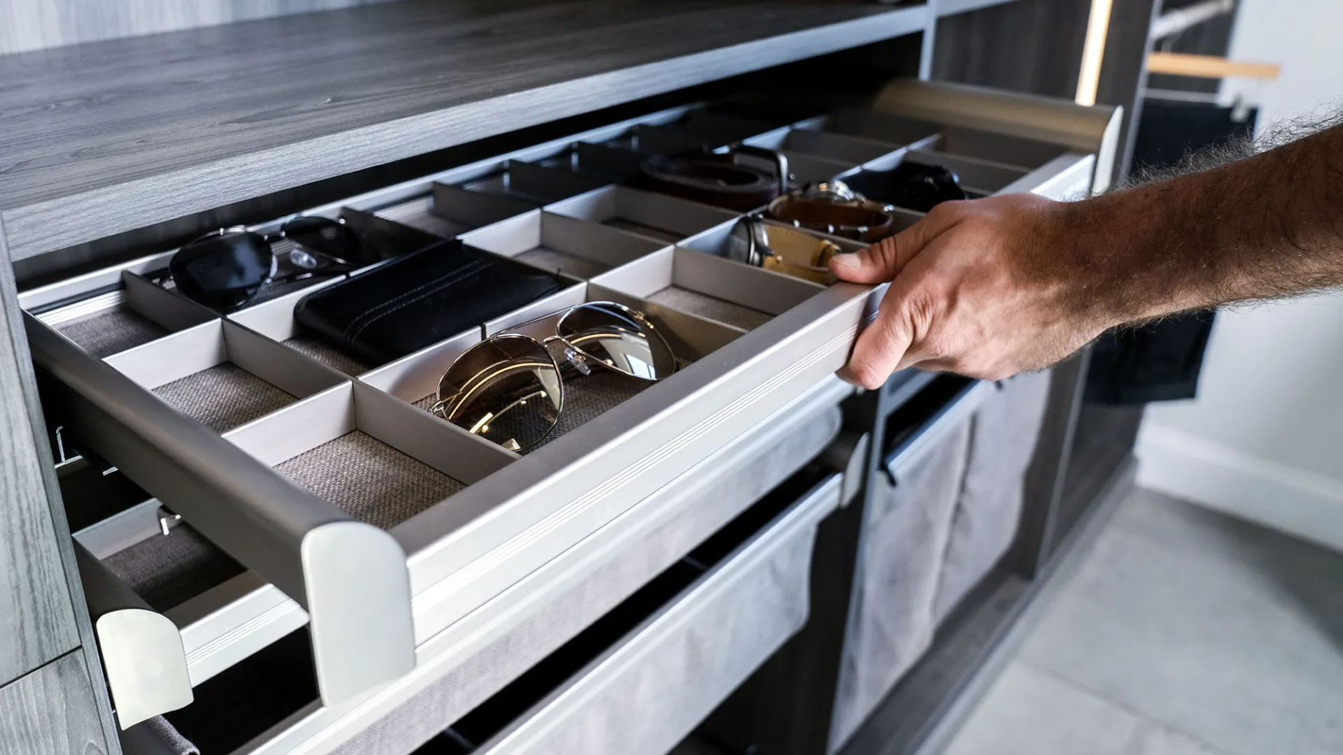 a person opening an oven