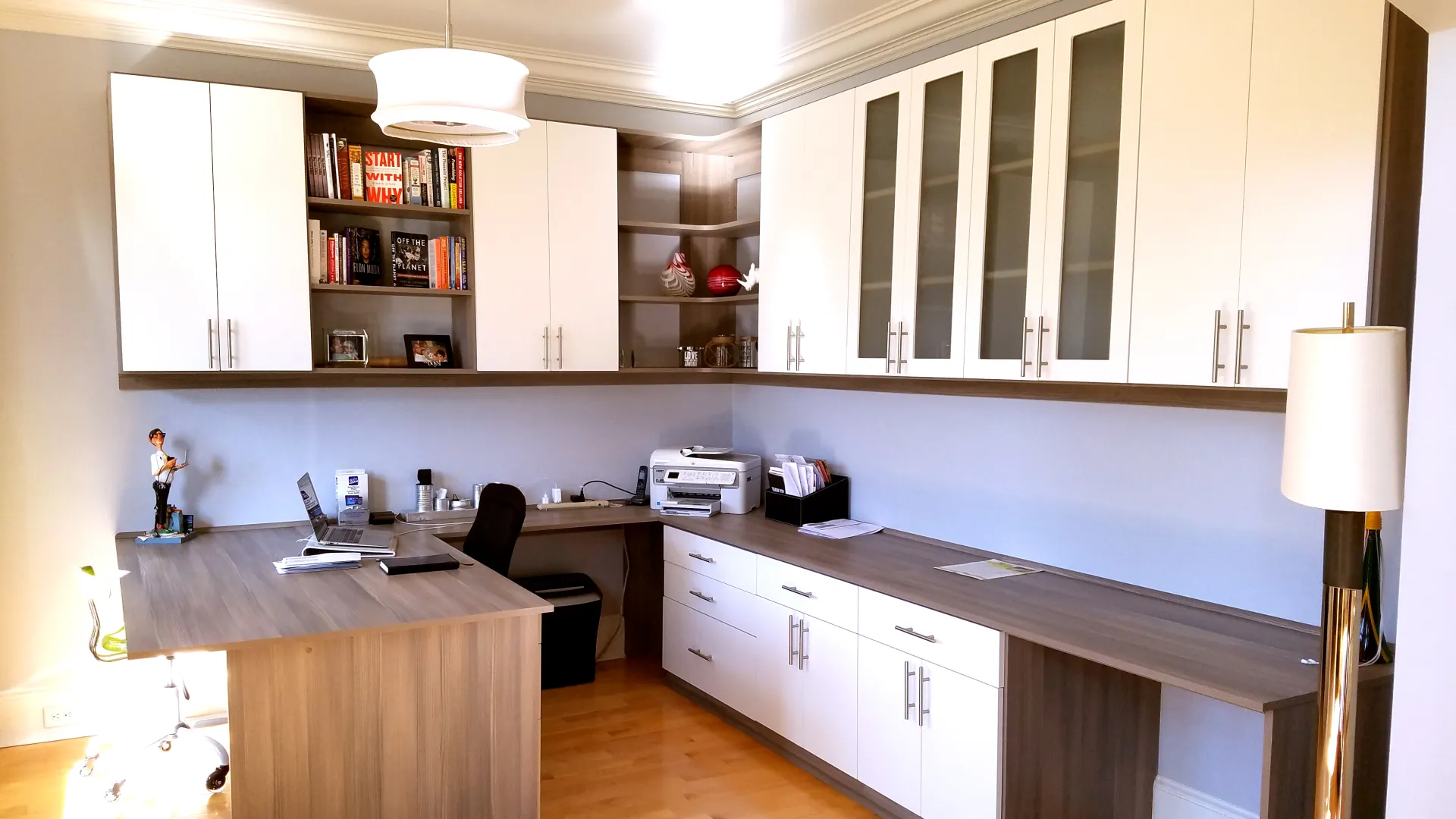 a kitchen with white cabinets