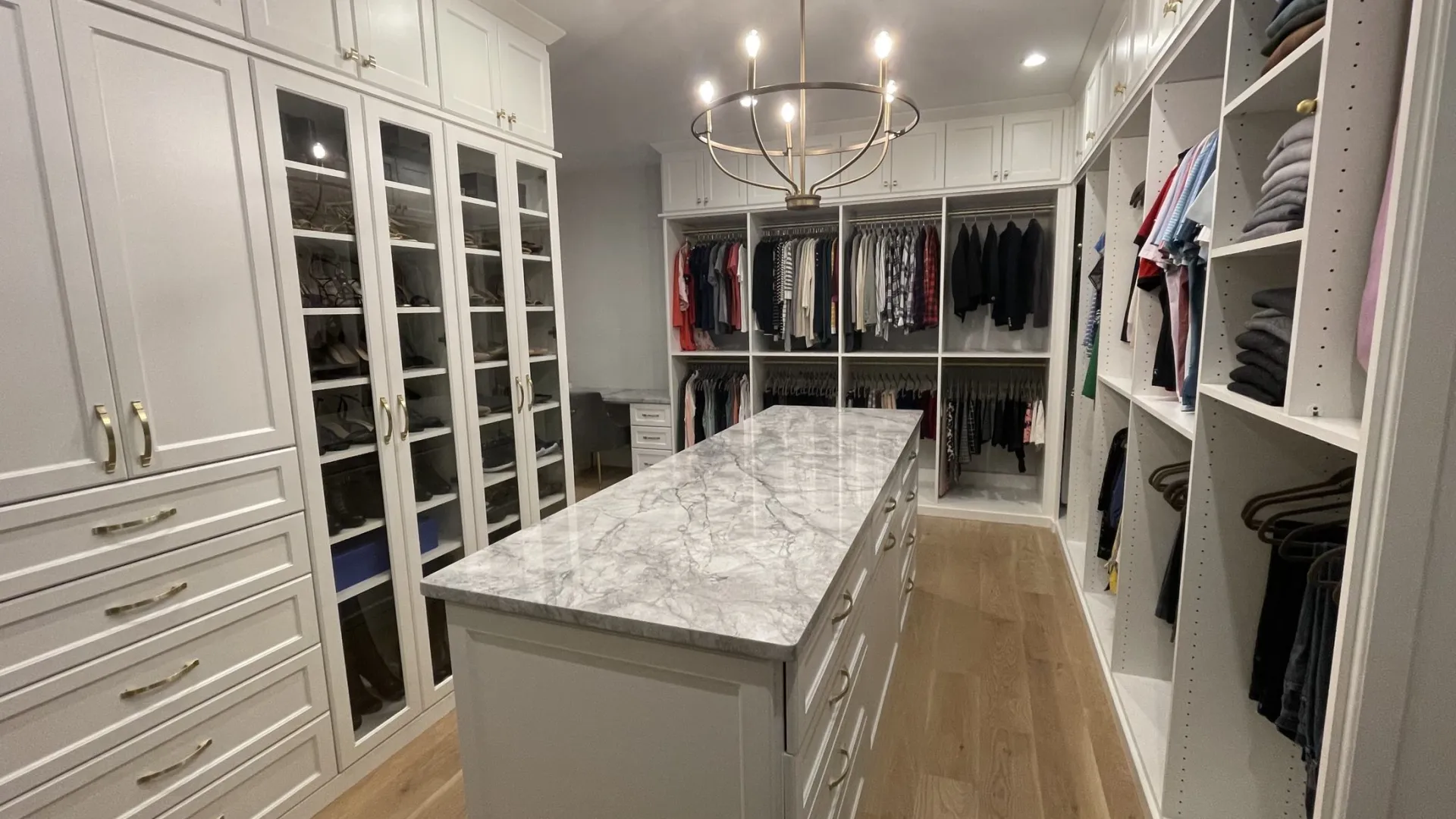 a kitchen with white cabinets