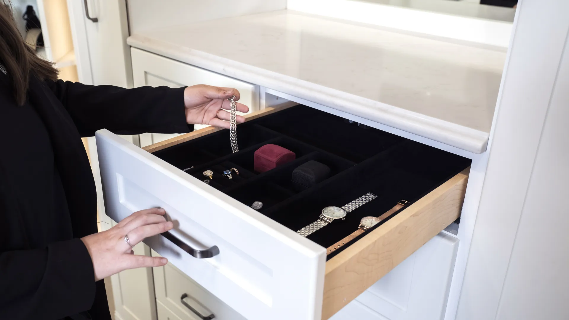 a person opening a drawer