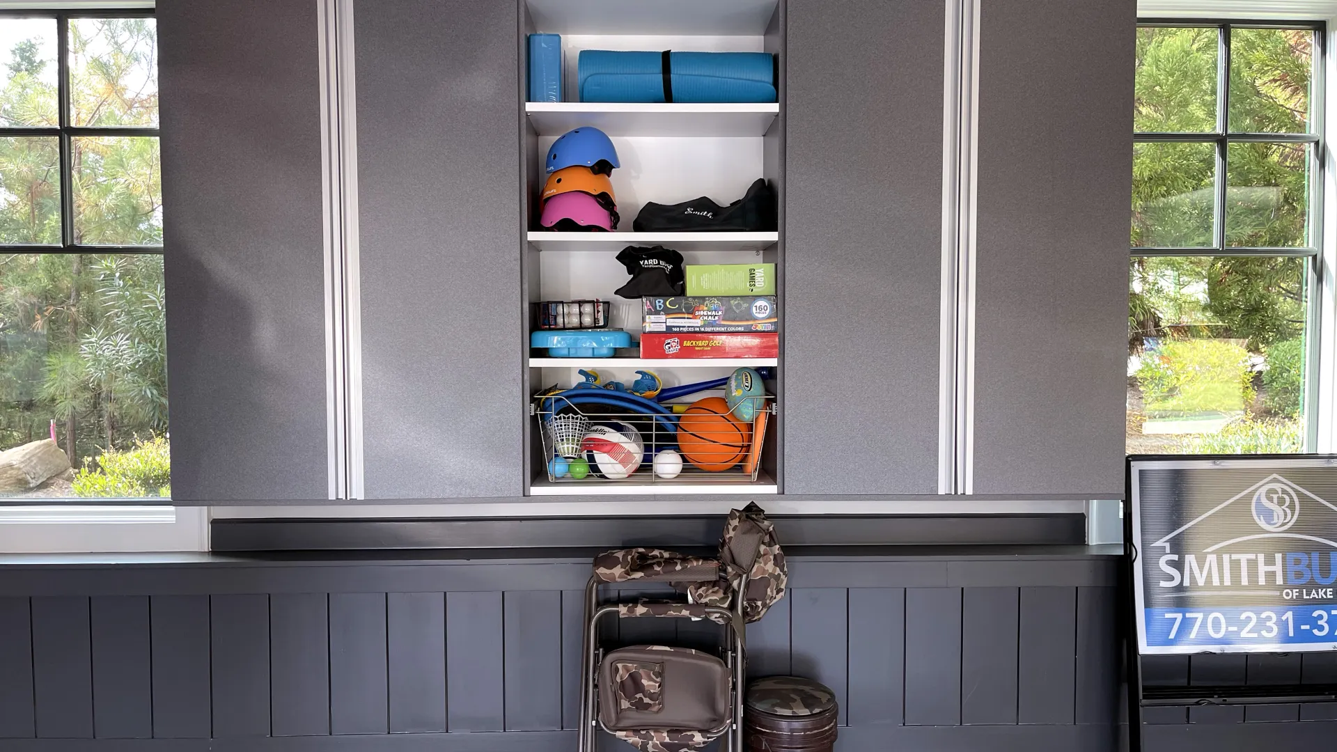 a kitchen with a shelf and shelves