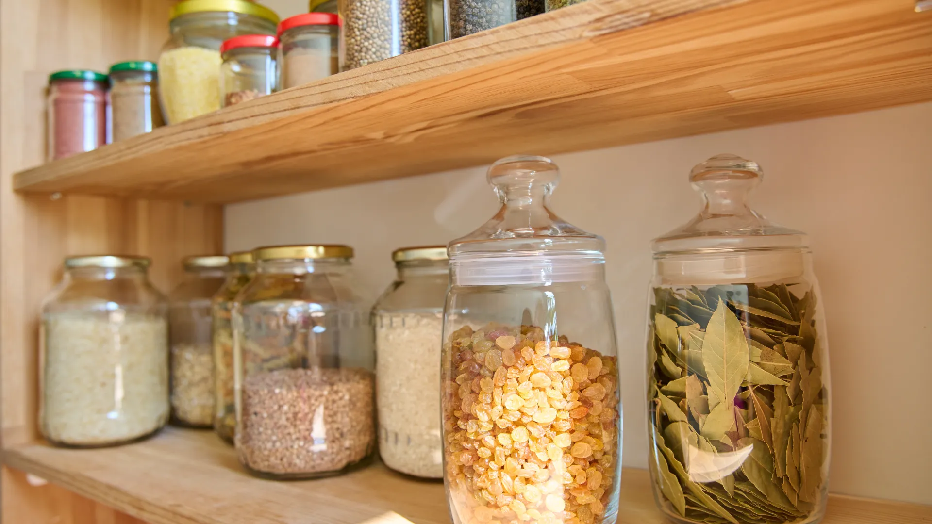 a shelf with jars of food on it