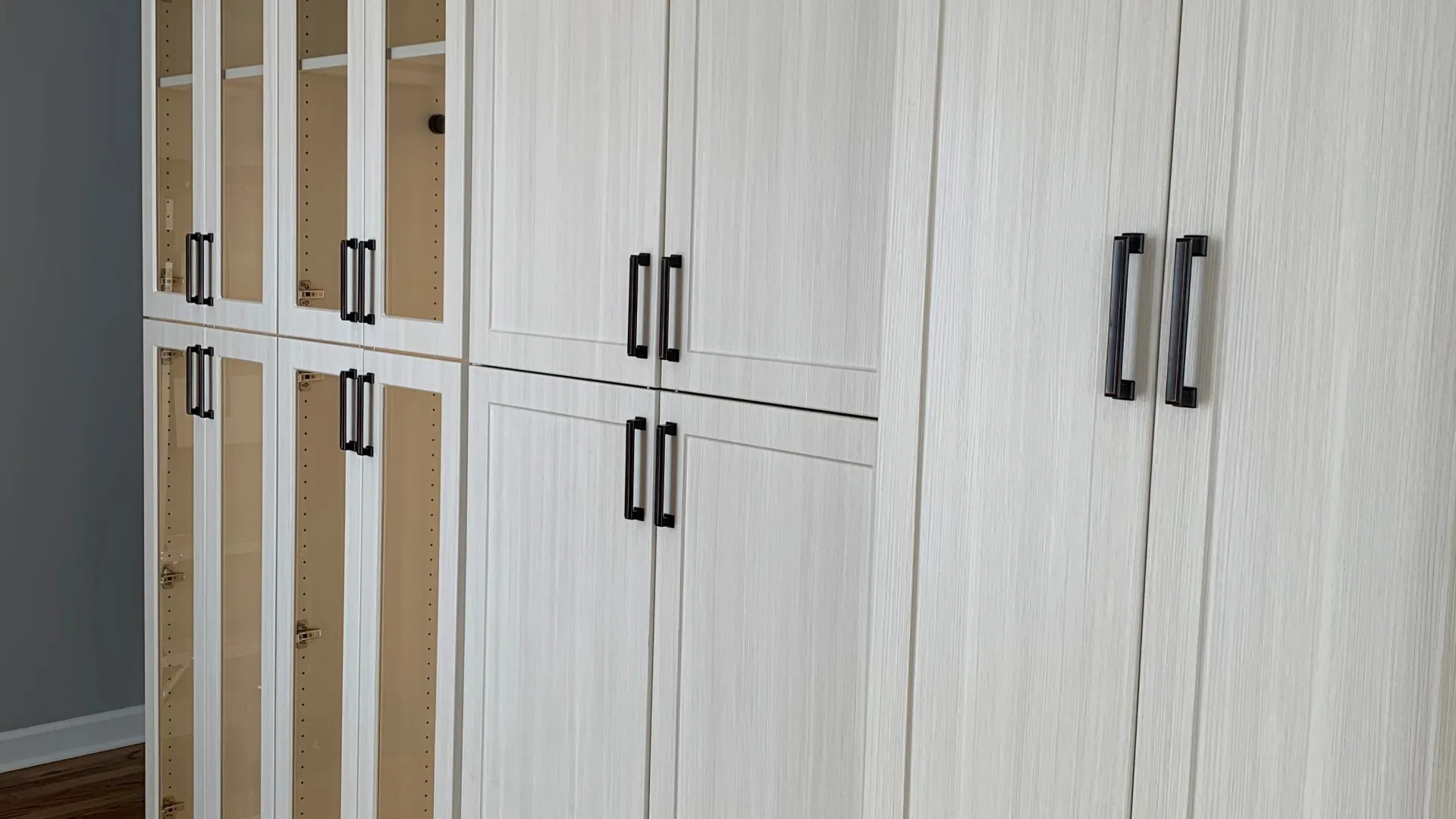 a white cabinet with drawers