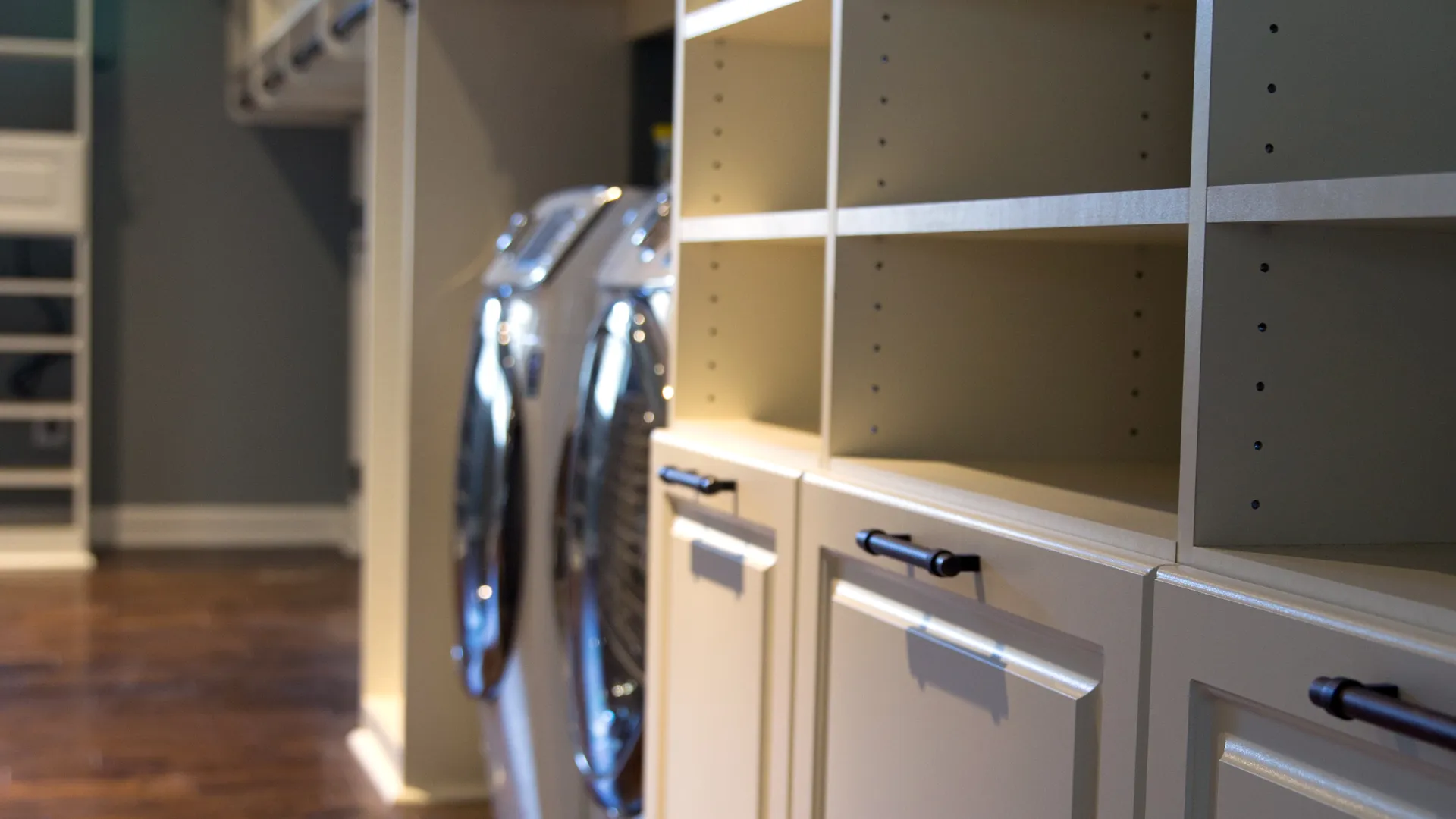 a kitchen with white cabinets