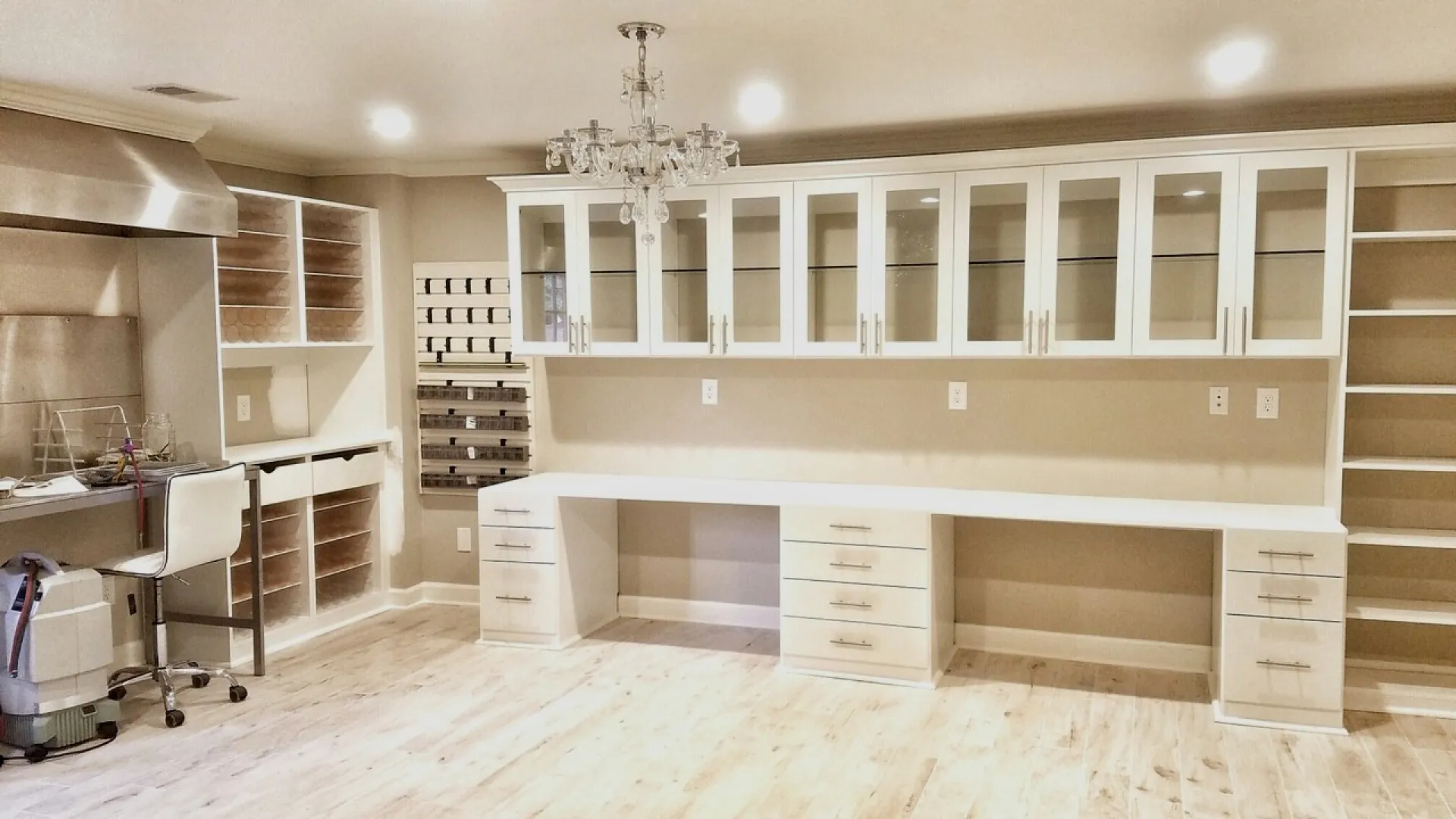 a kitchen with white cabinets