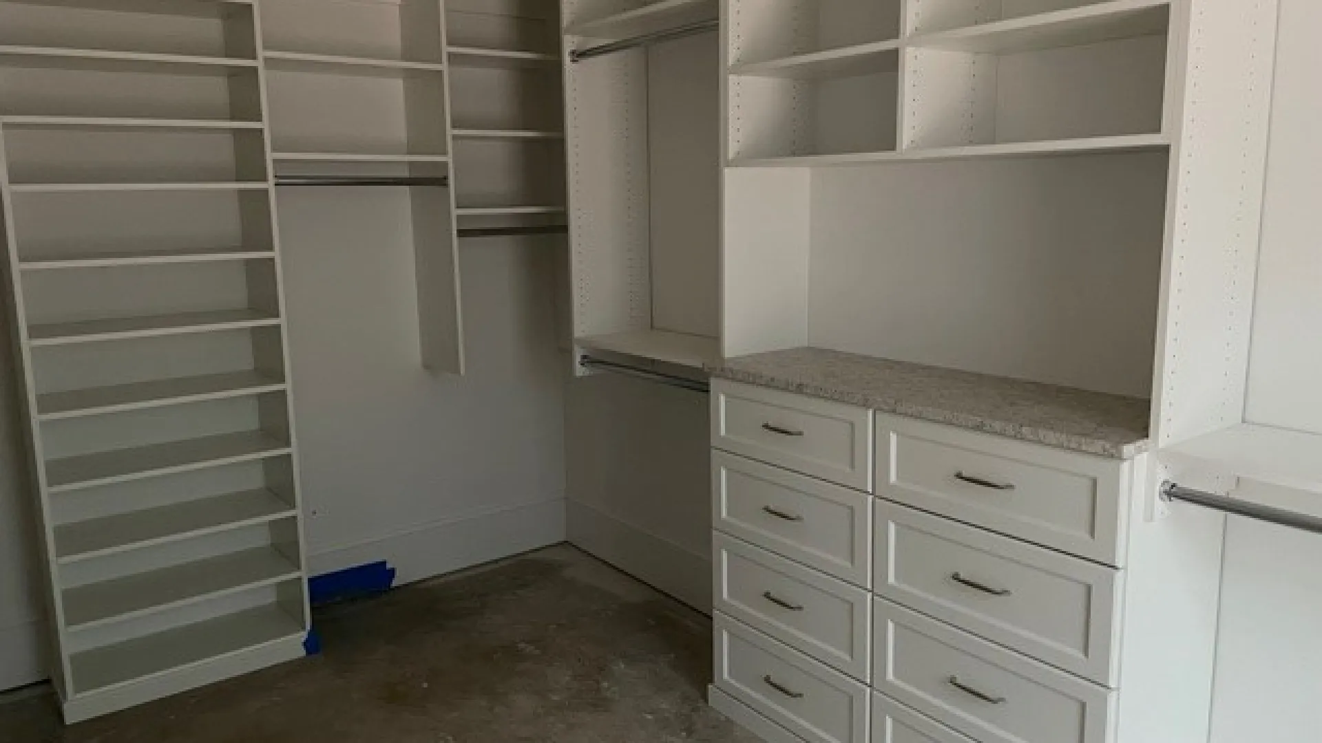 a room with white cabinets