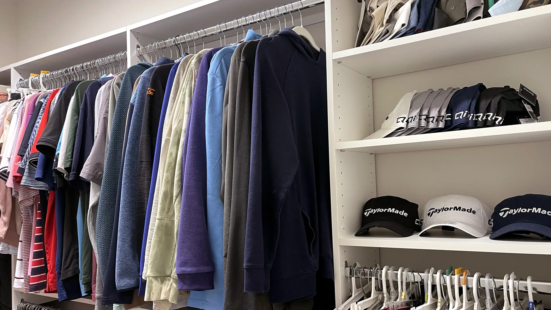 a closet full of hats and shirts