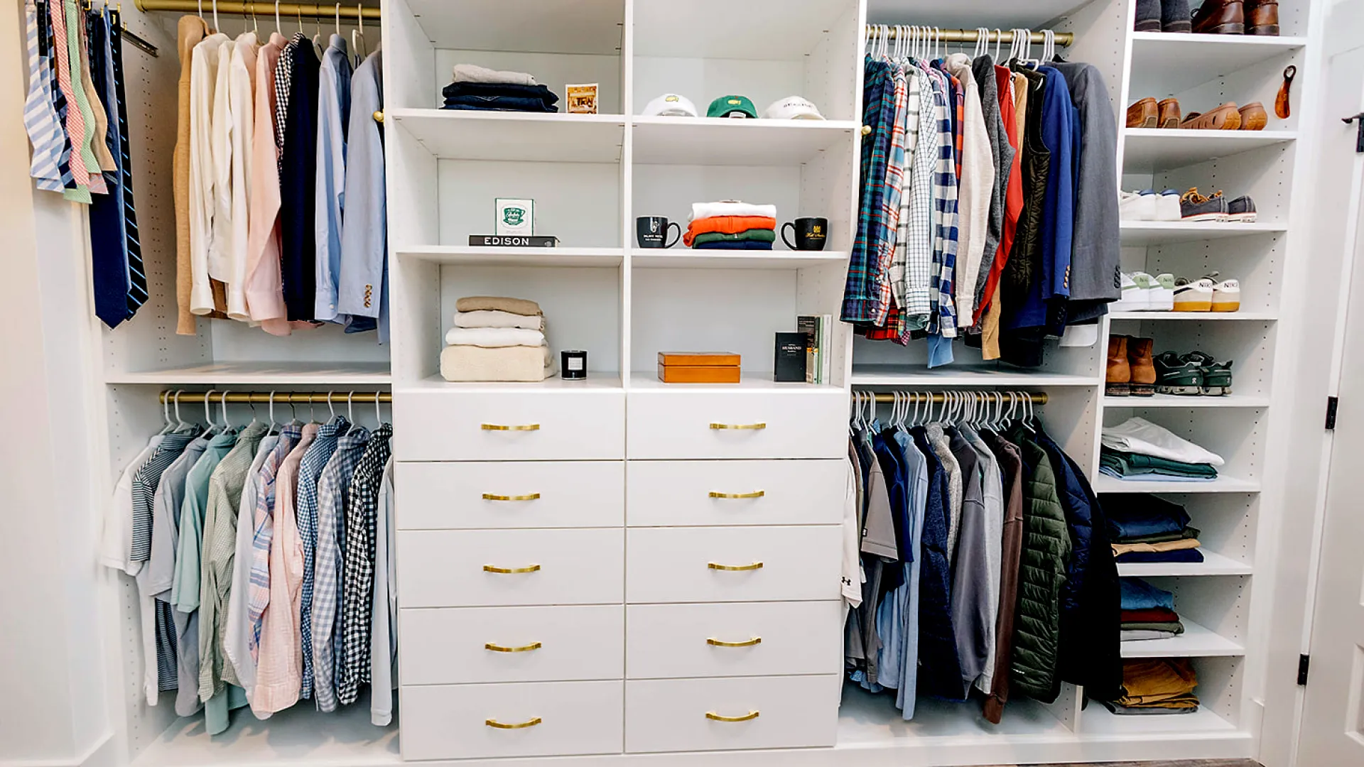 a closet with clothes and clothes