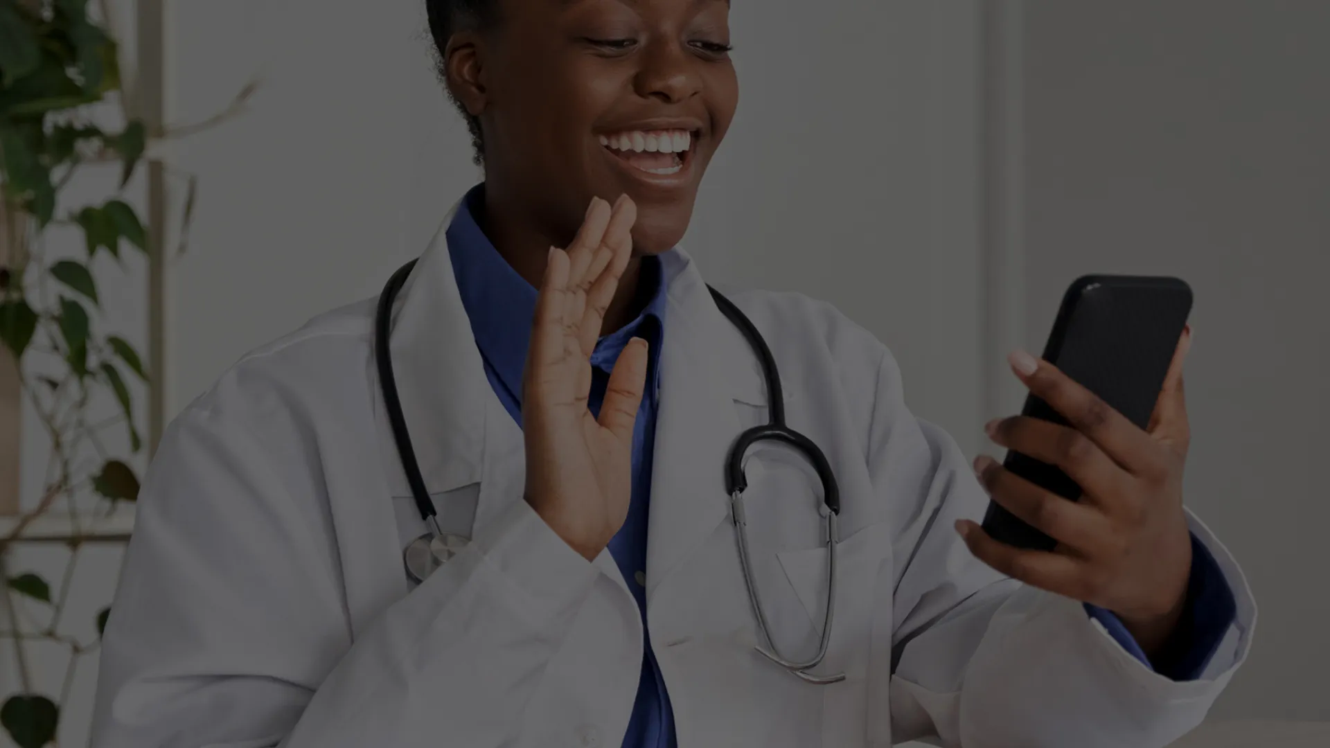 a doctor using a phone