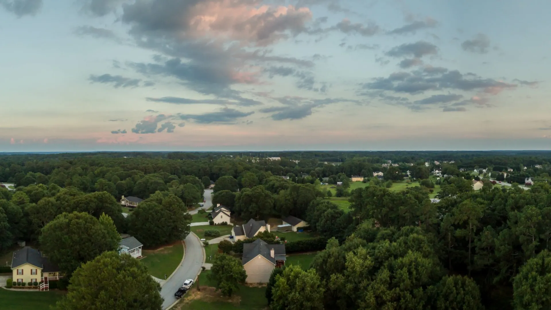 a landscape with trees and buildings