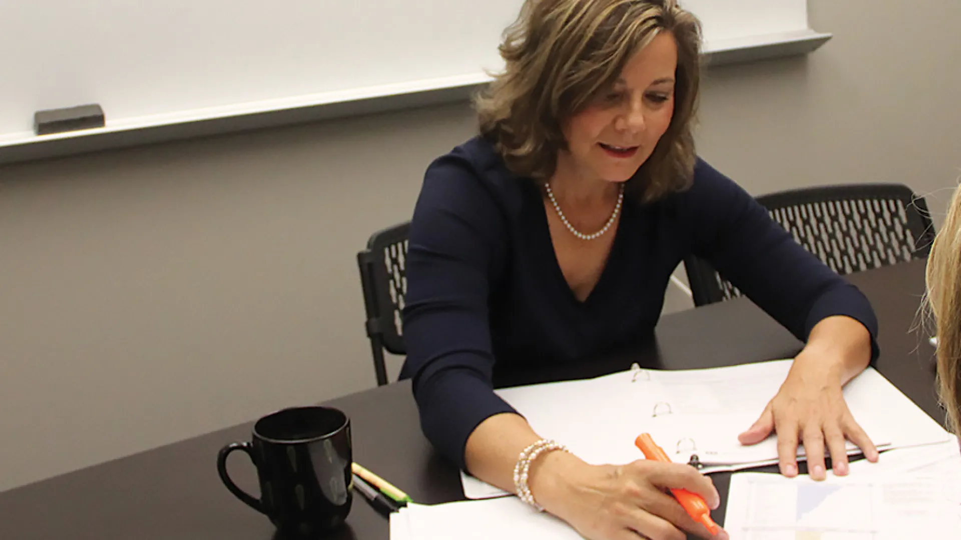 a person sitting at a desk