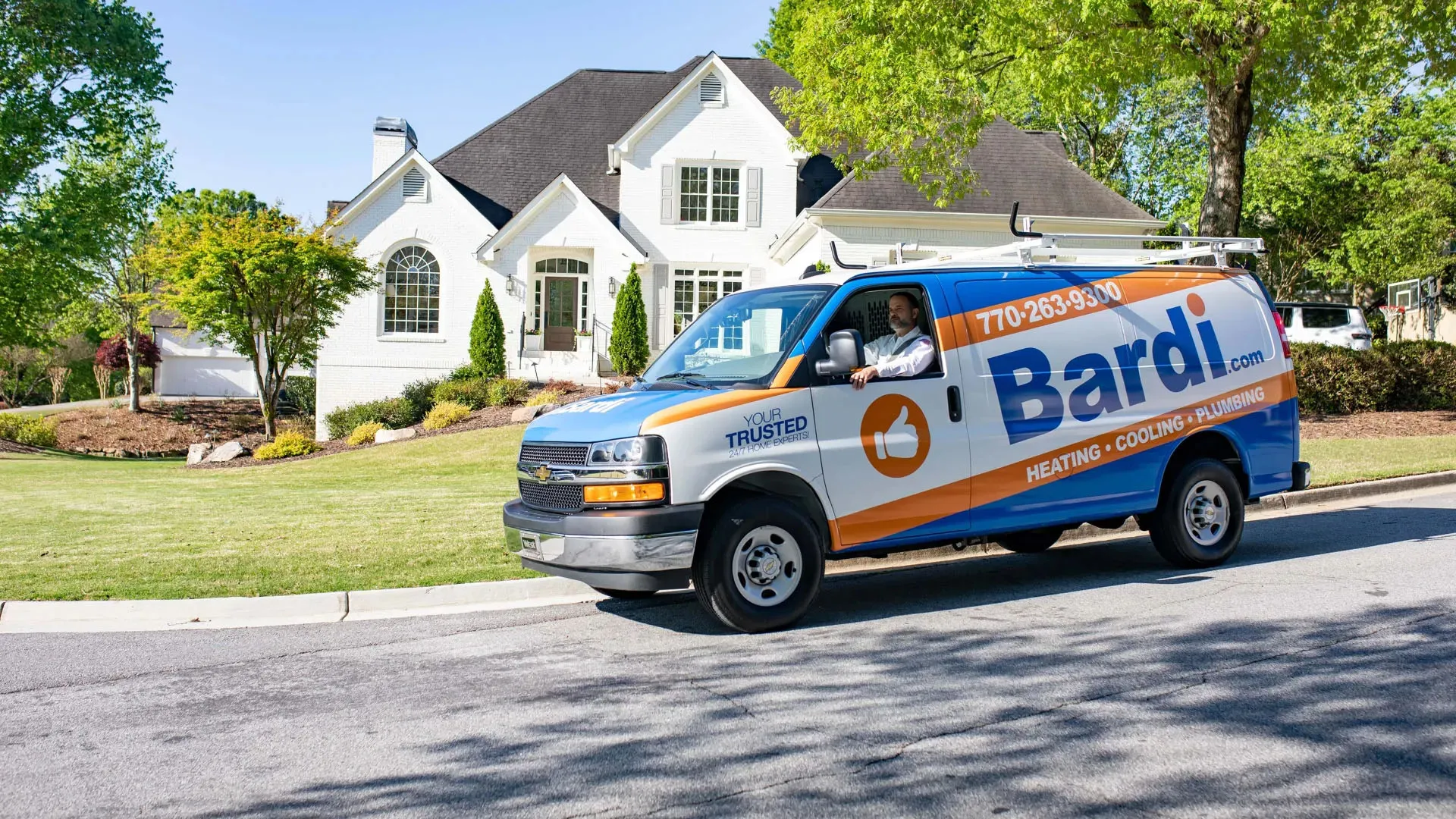 a van parked on the side of a road