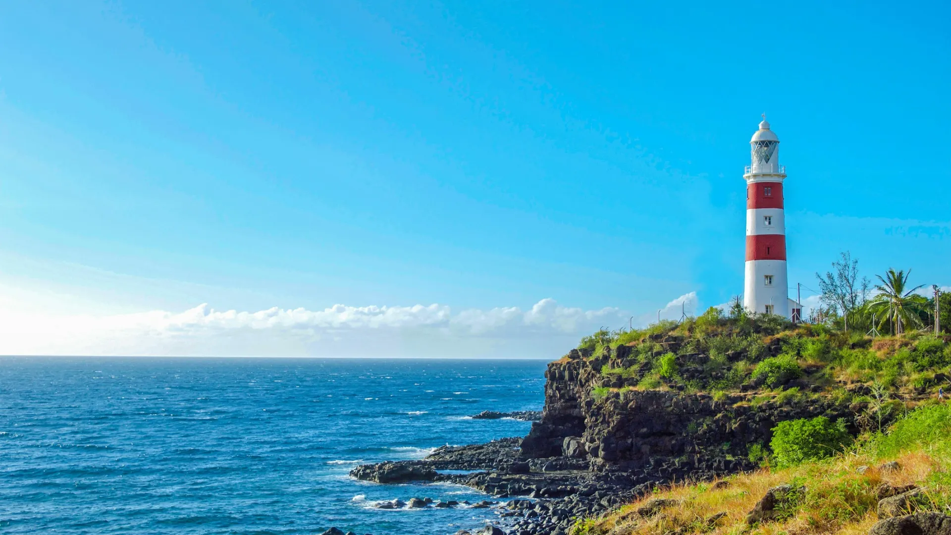 a lighthouse on a rocky coast