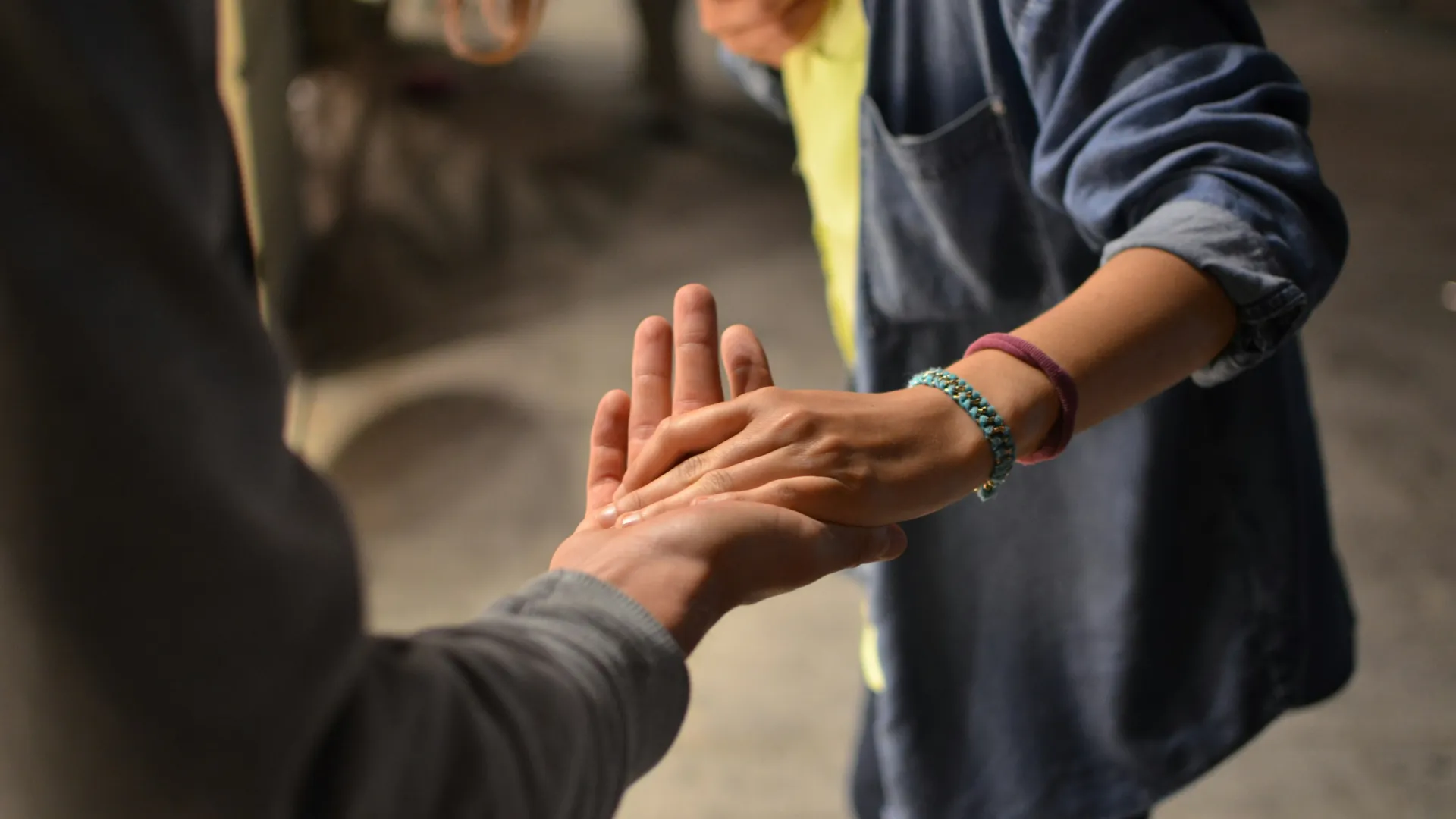 a person holding their hands up