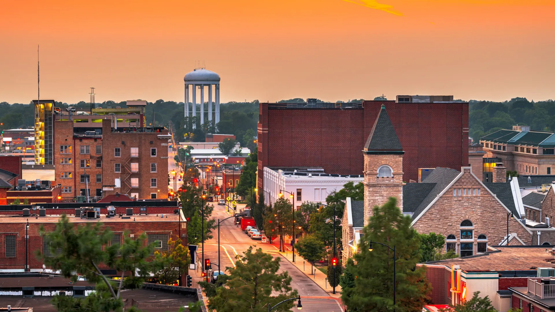 a city with buildings and a water tower