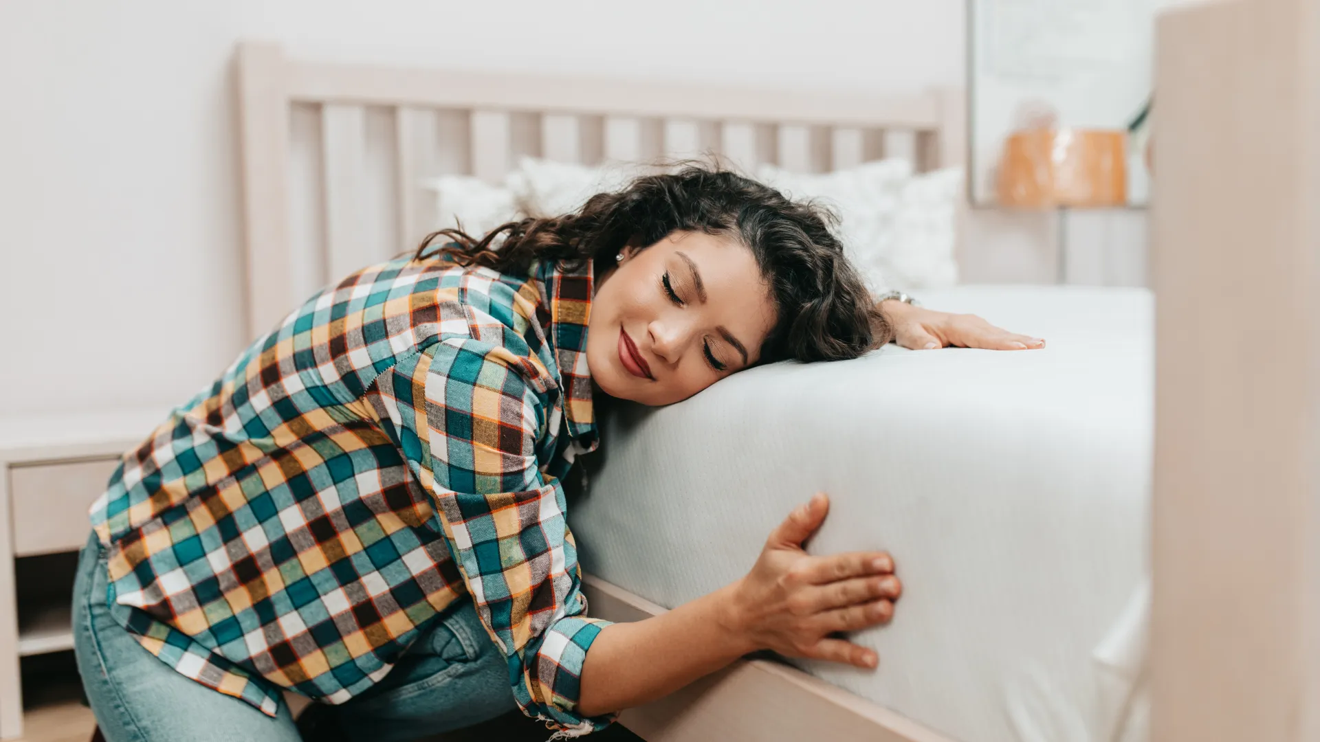 a person lying on a bed