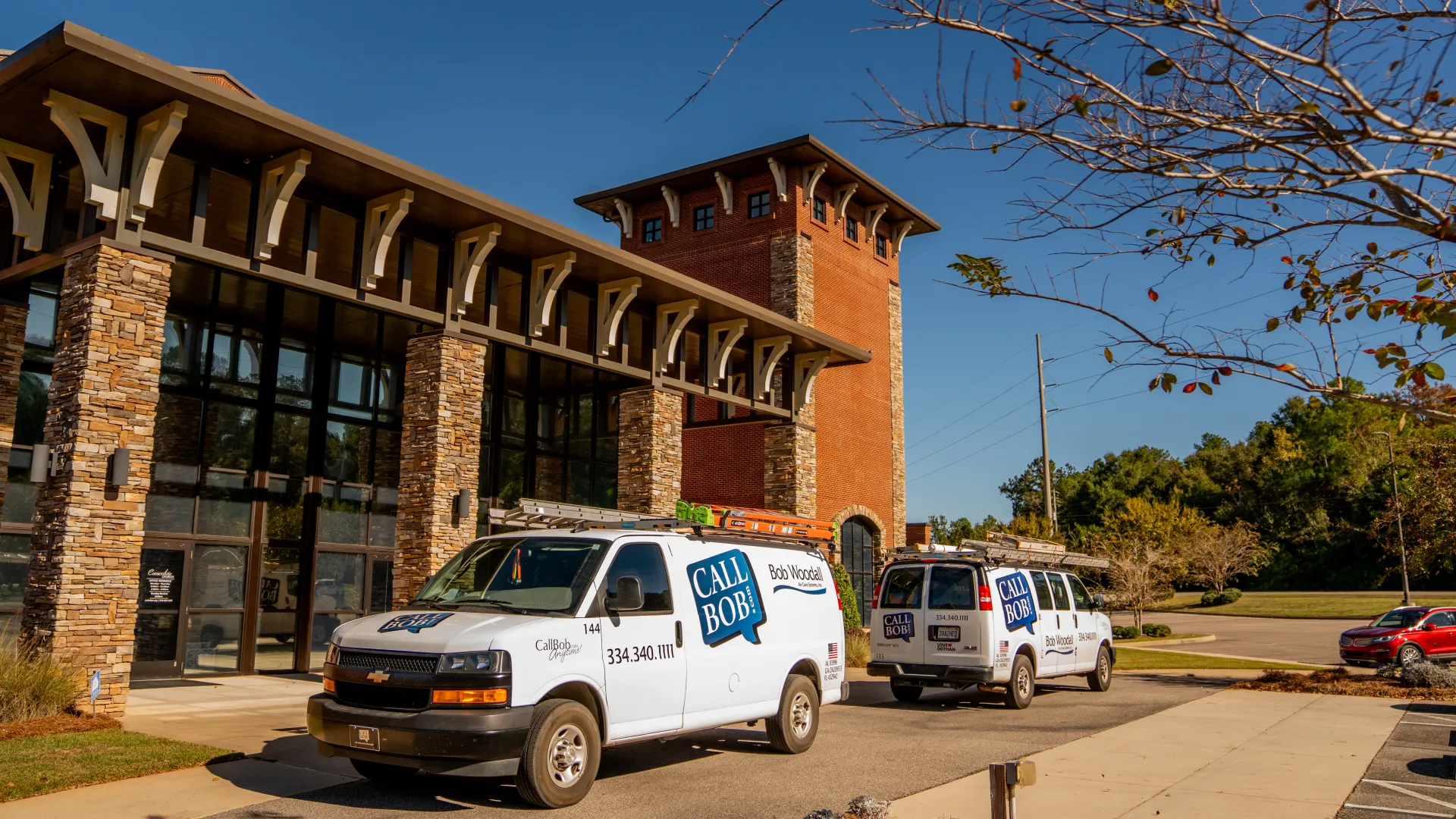 a white truck parked in front of a building