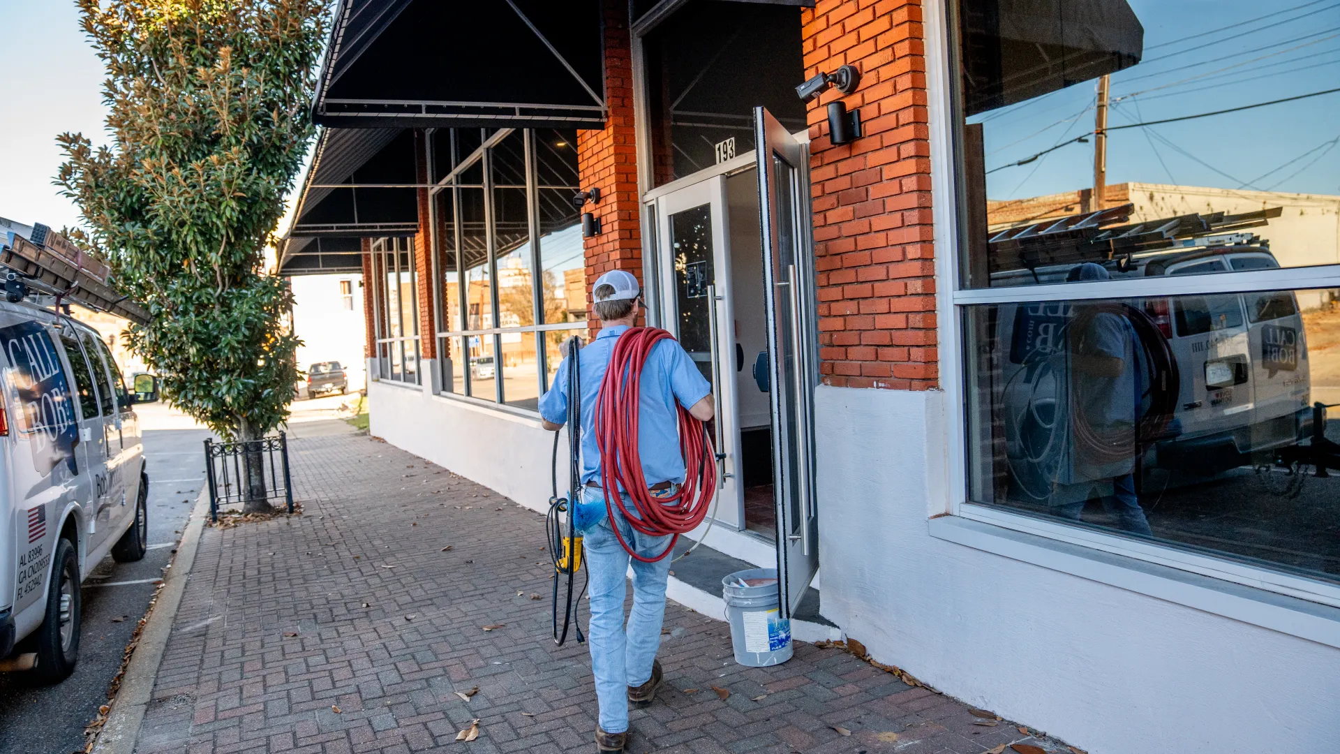 a person walking down a sidewalk