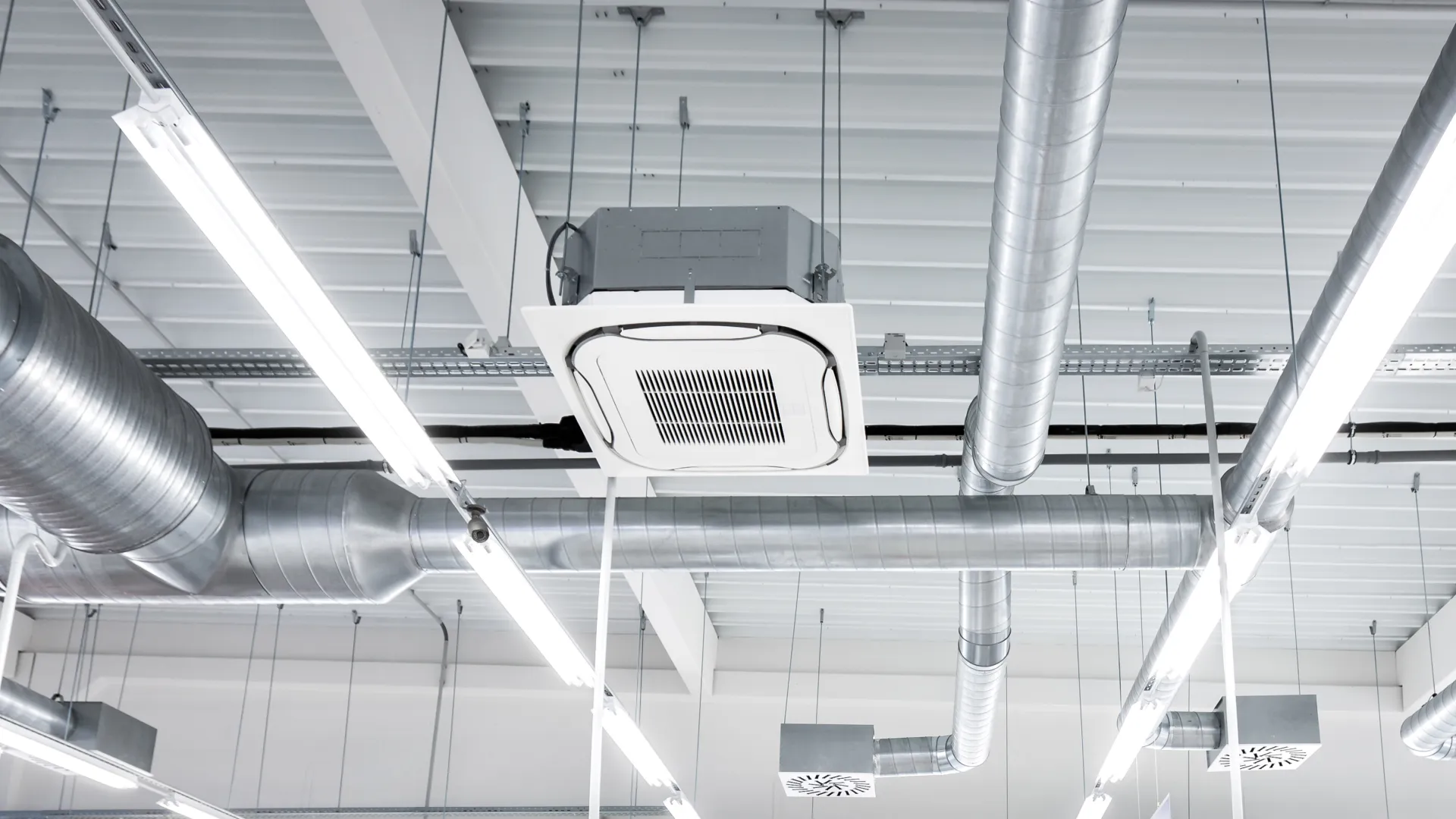 a large room with a large white ceiling and a large white ceiling